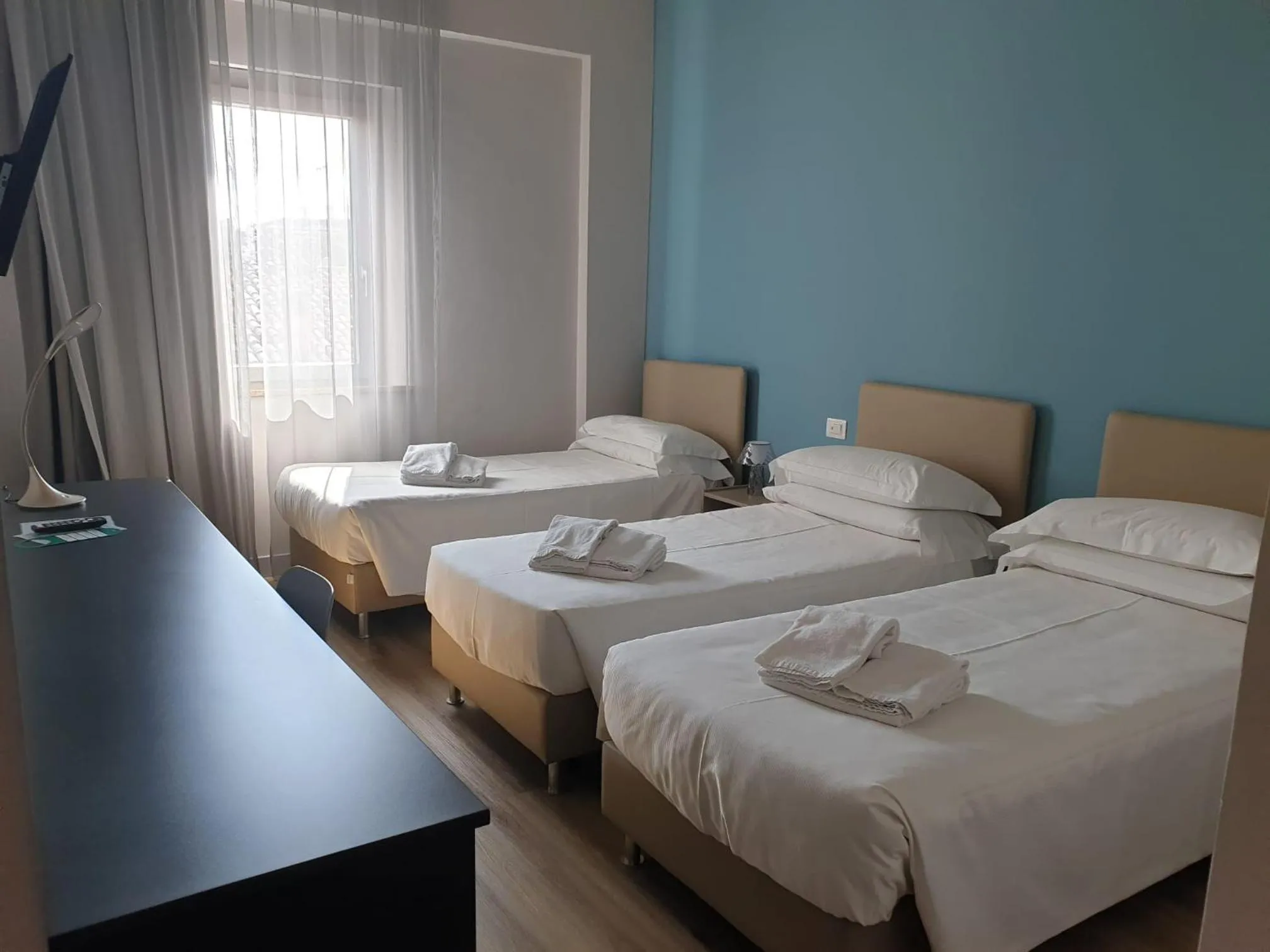 Bed in Hotel De La Ville depandance di Hotel Augustus