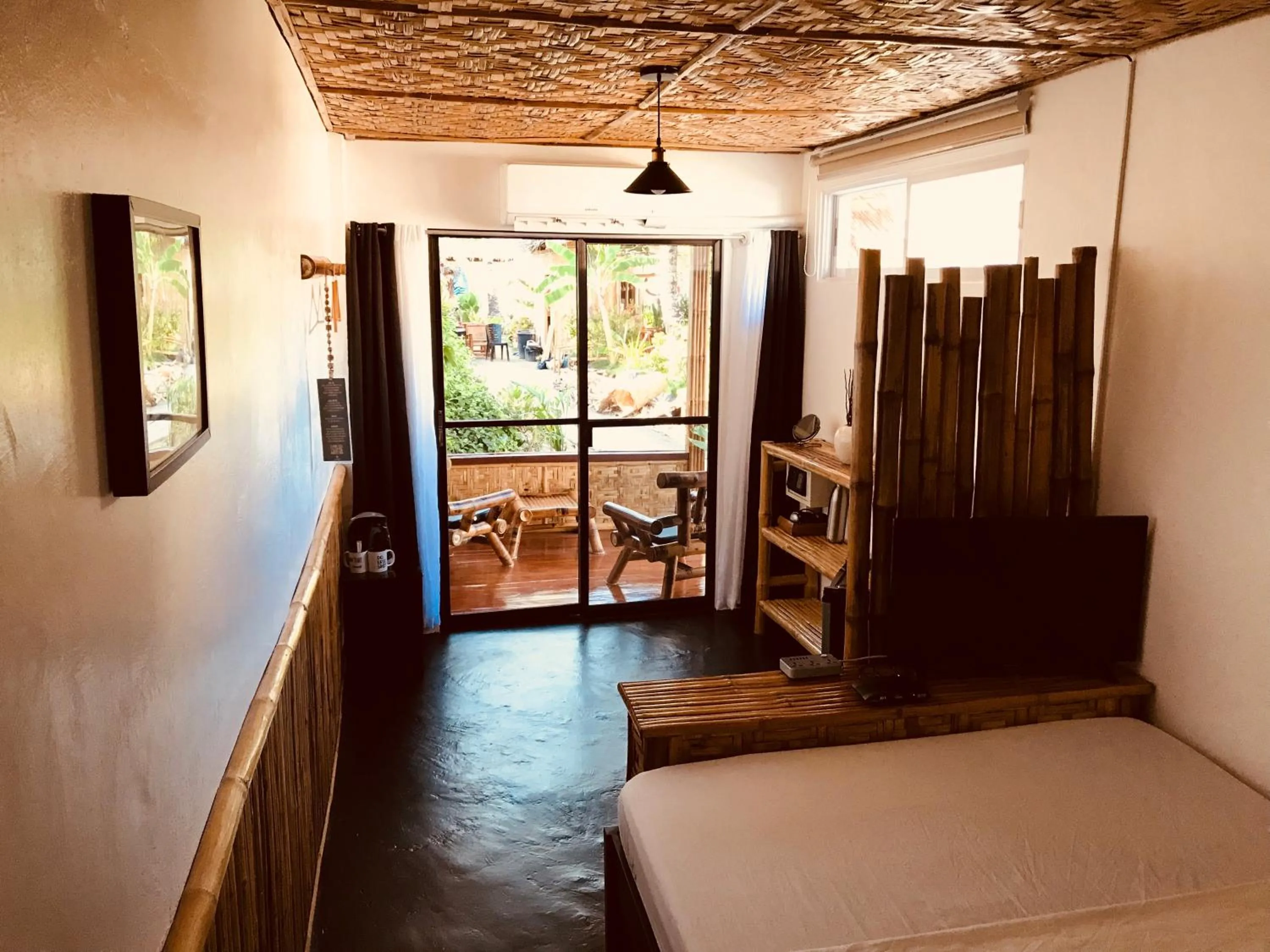 Patio, Bed in Everyday Sunday Hotel & Cafe