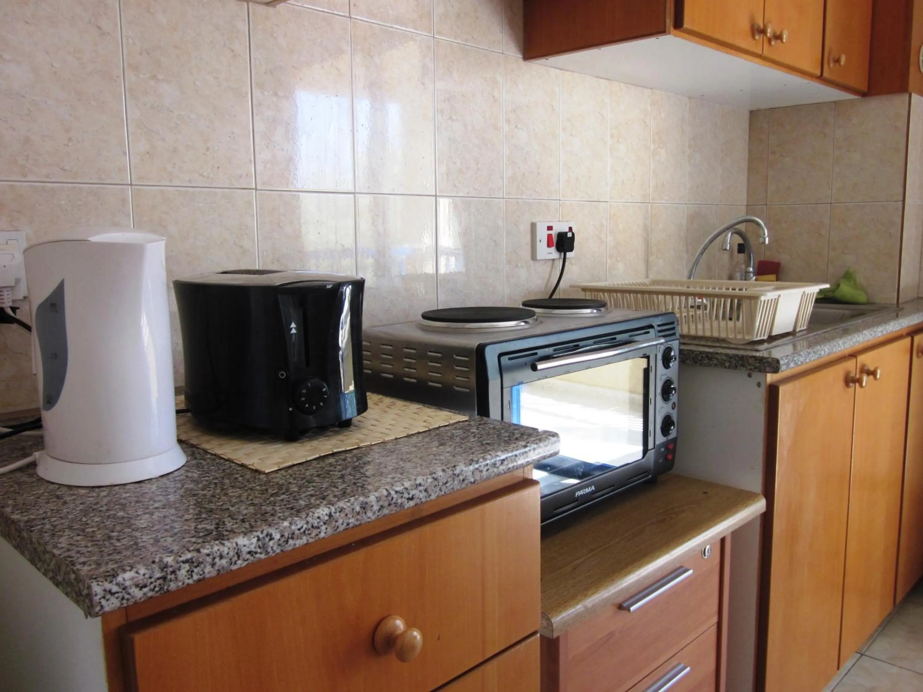 Kitchen or kitchenette in Georgia Apartments