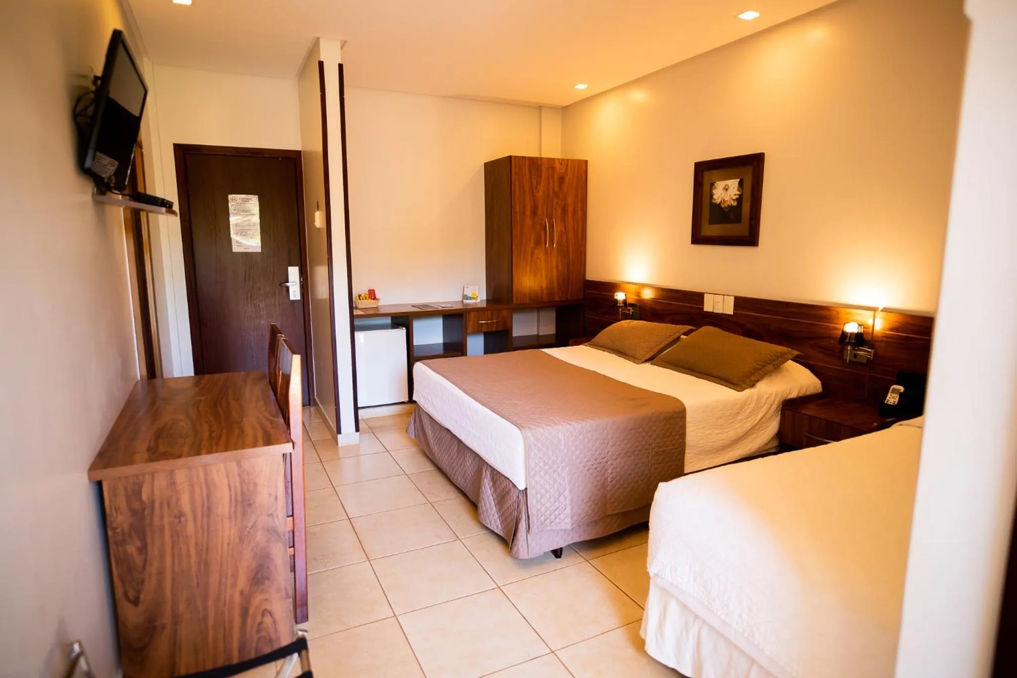 Bed in Hotel das Palmeiras