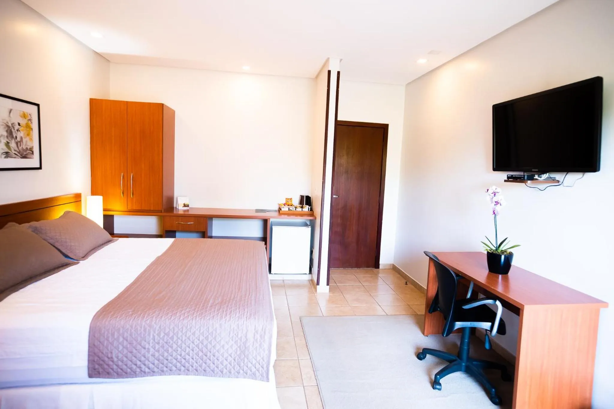 Bed in Hotel das Palmeiras