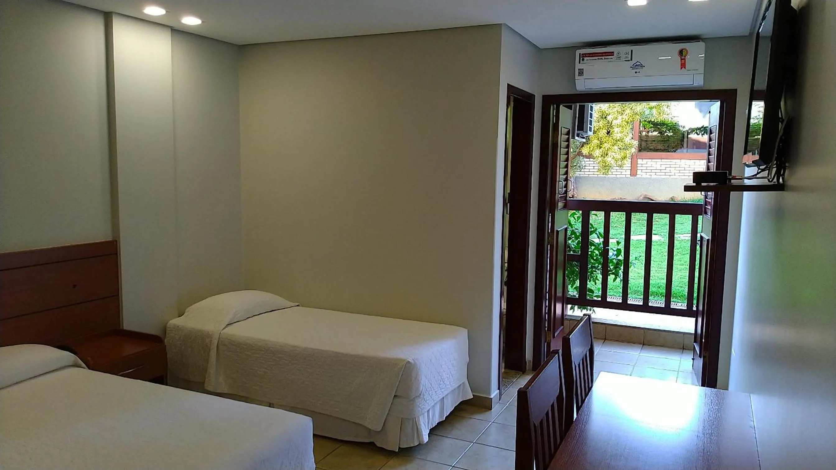 Bed in Hotel das Palmeiras