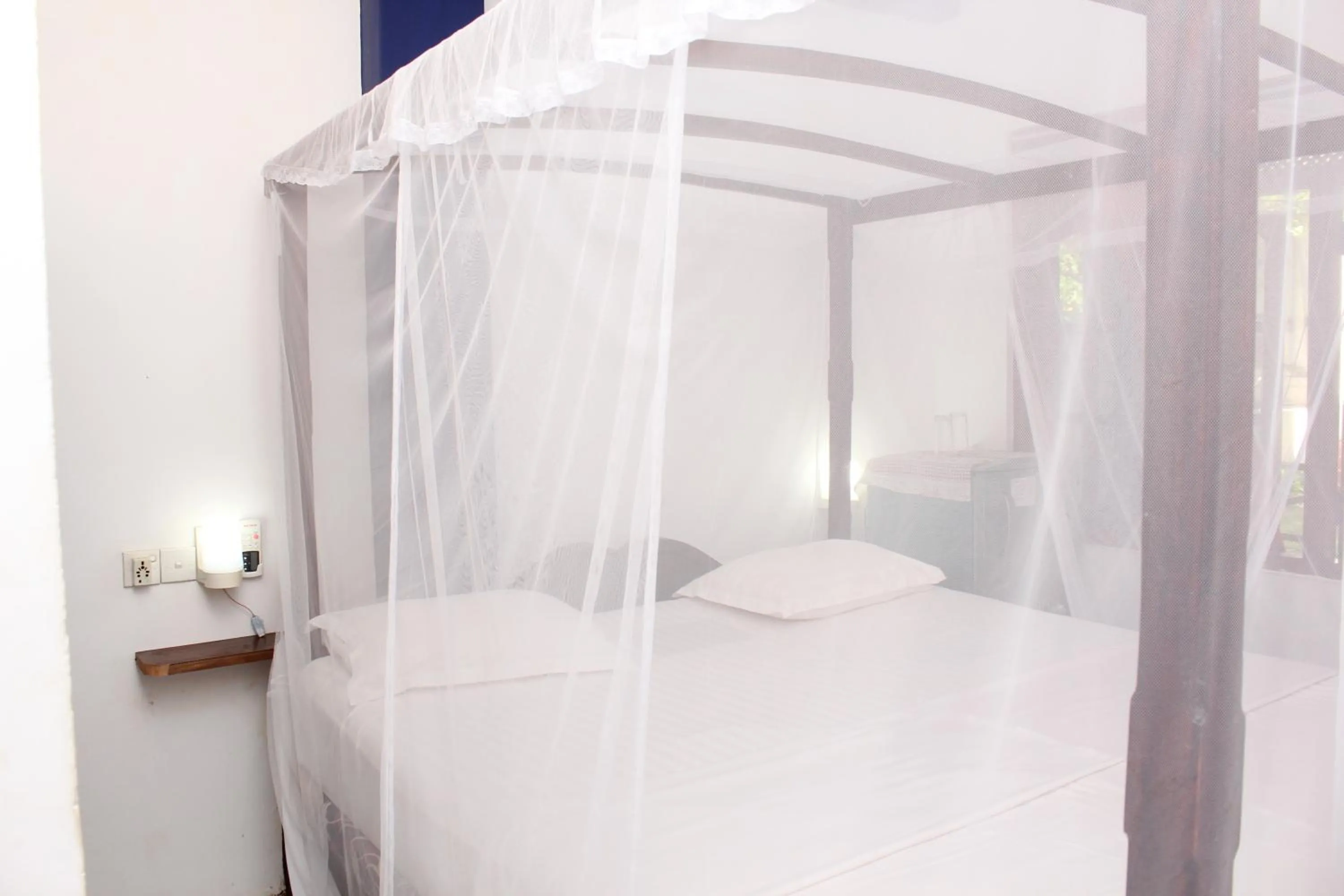 Bed in Jagabay Resort & Surfing School