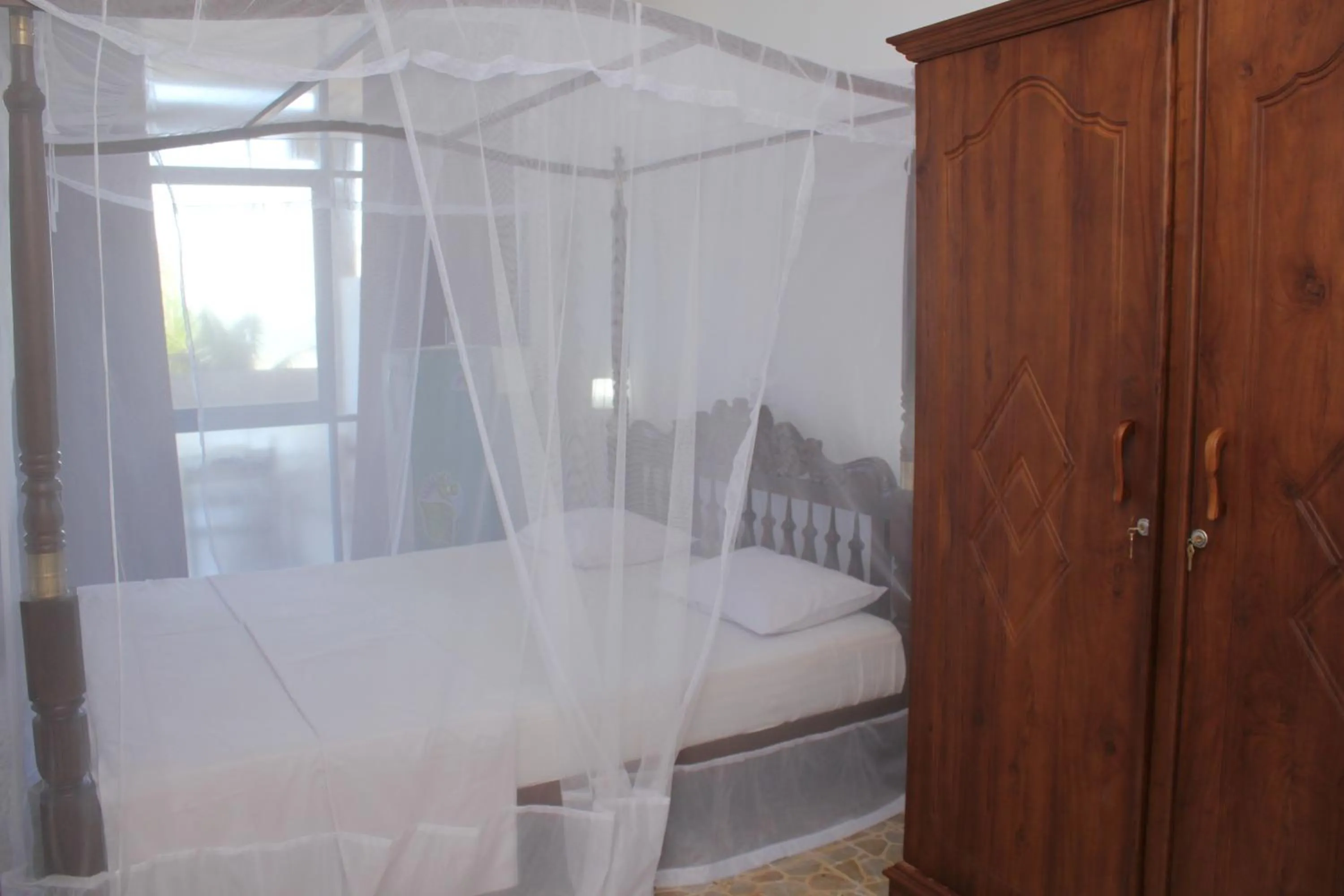 Bed in Jagabay Resort & Surfing School