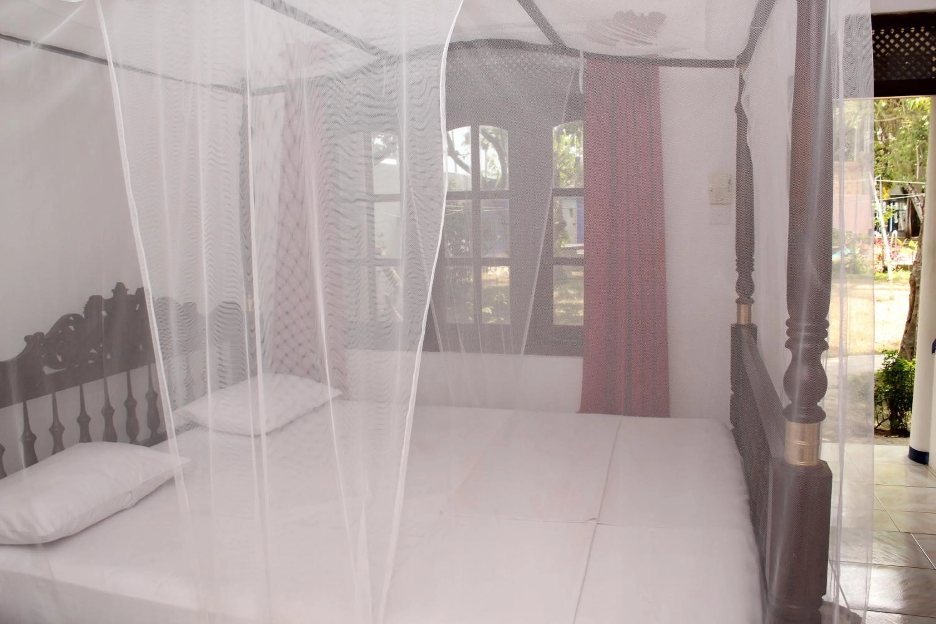 Bed in Jagabay Resort & Surfing School