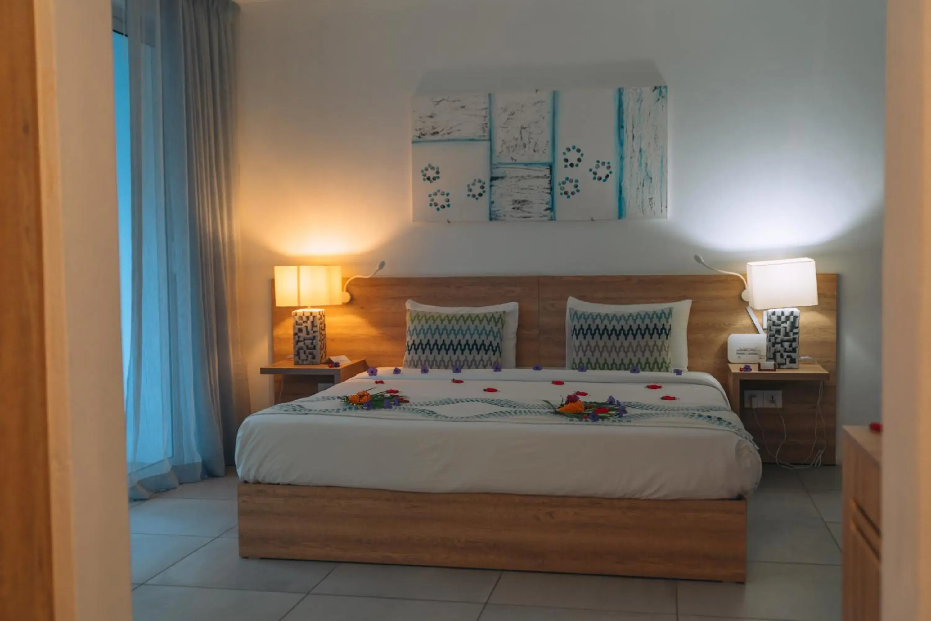 Bed in Casuarina Resort & Spa