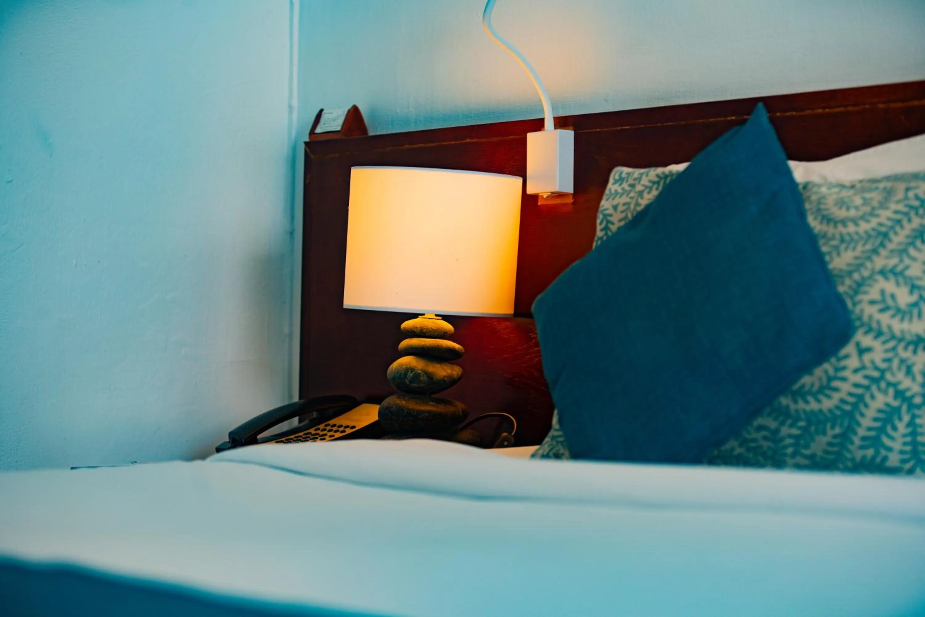 Bed in Casuarina Resort and Spa