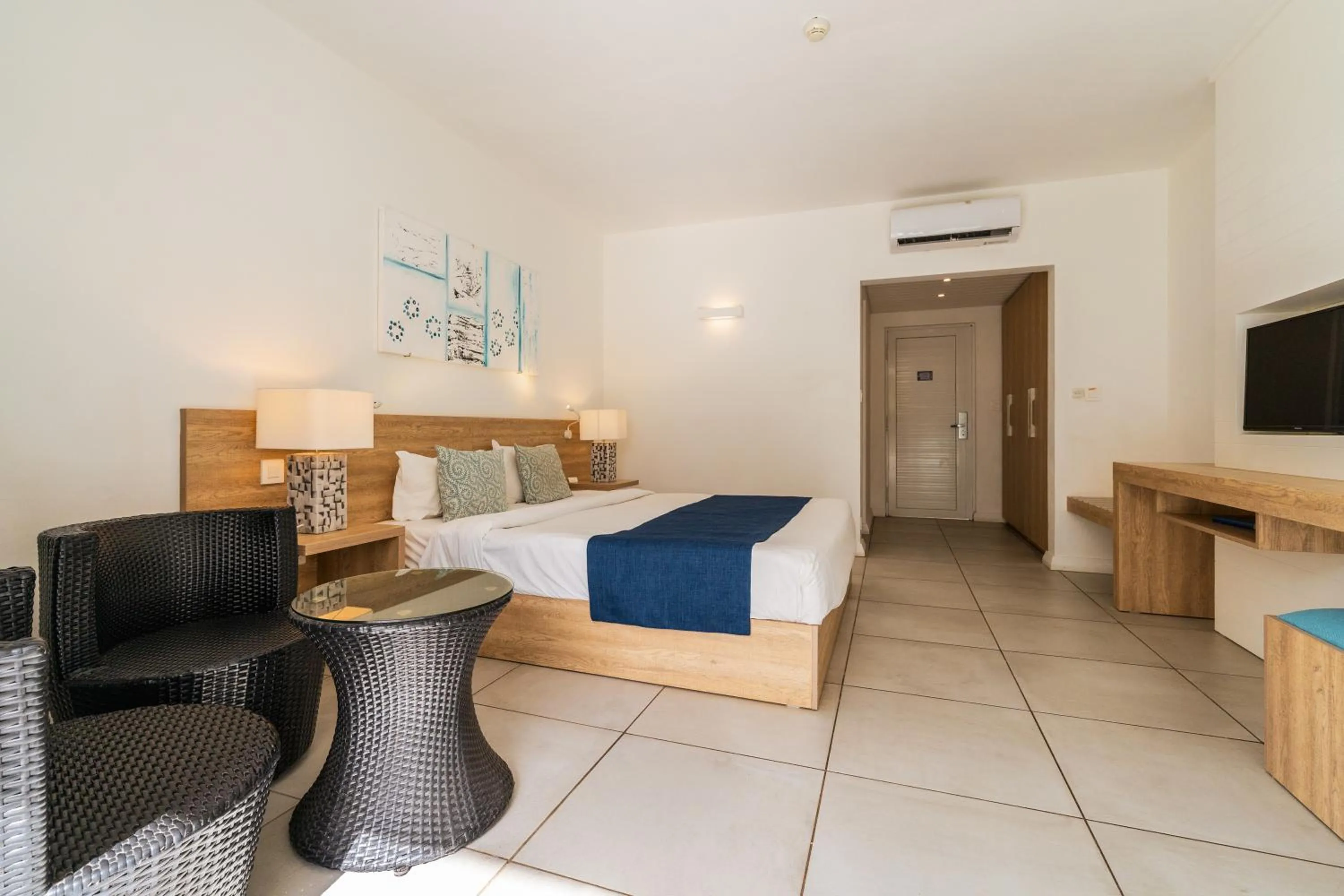 Bed in Casuarina Resort and Spa