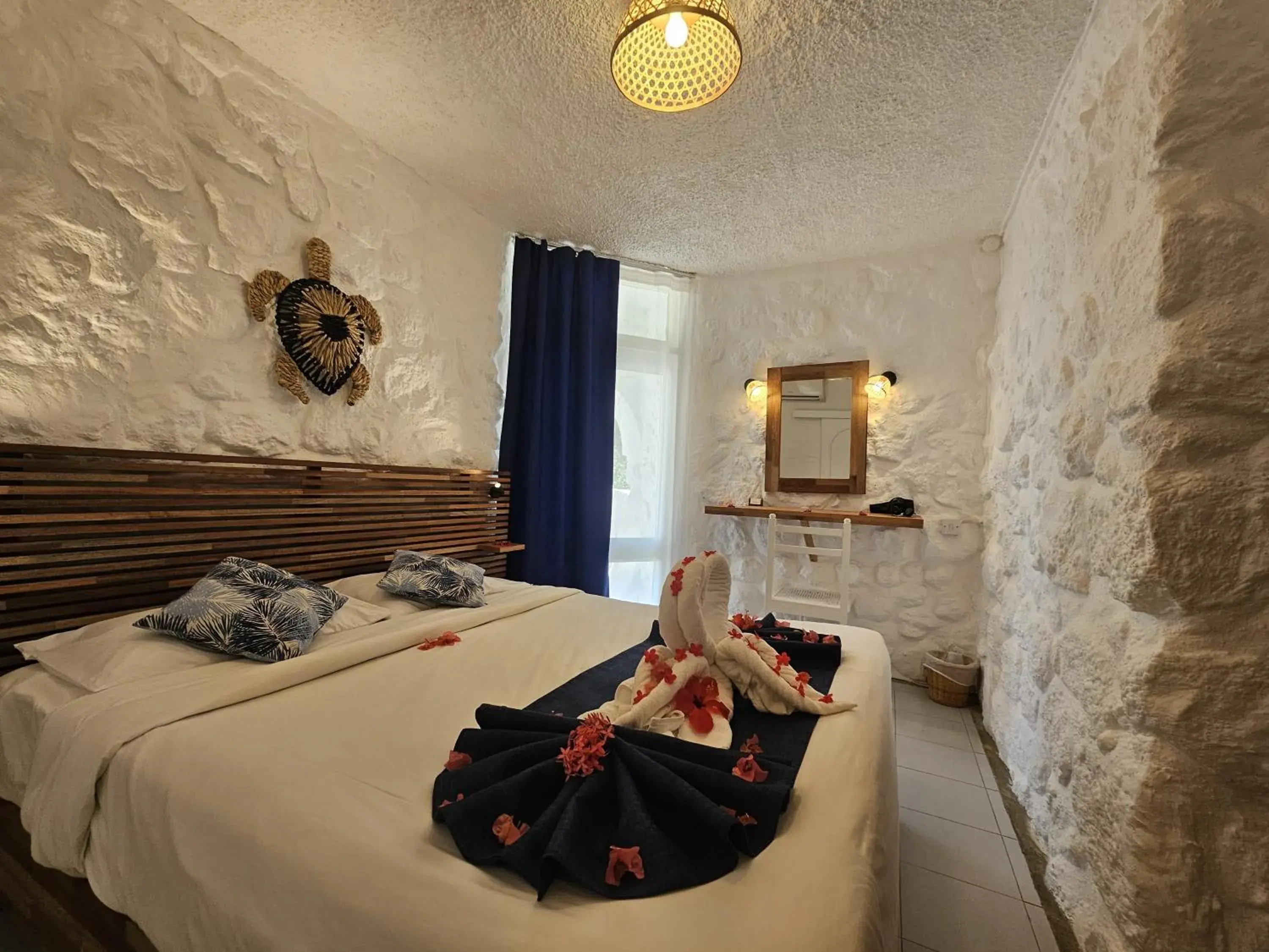 Bed in Casuarina Resort and Spa Bed in Casuarina Resort and Spa