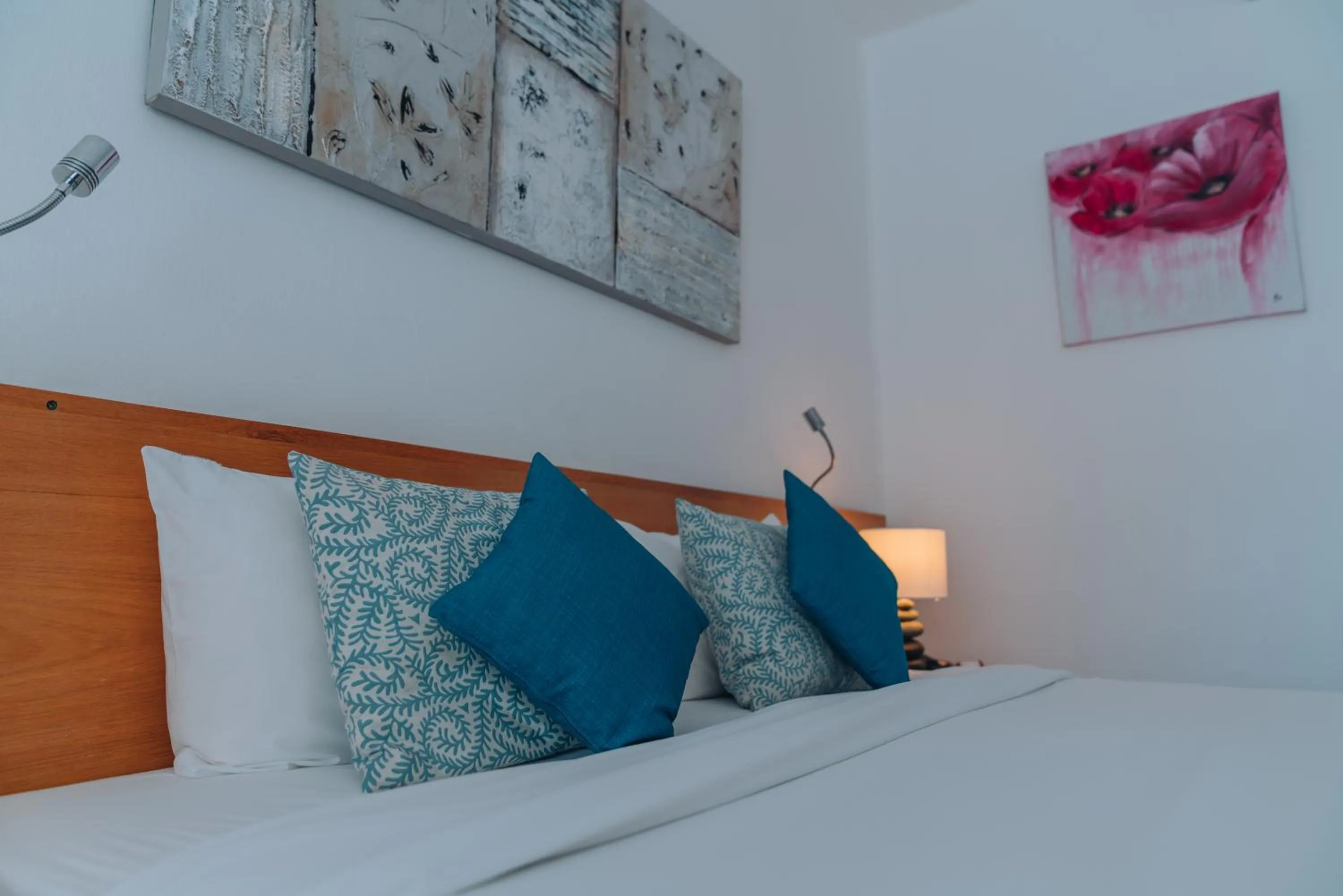 Bed in Casuarina Resort and Spa