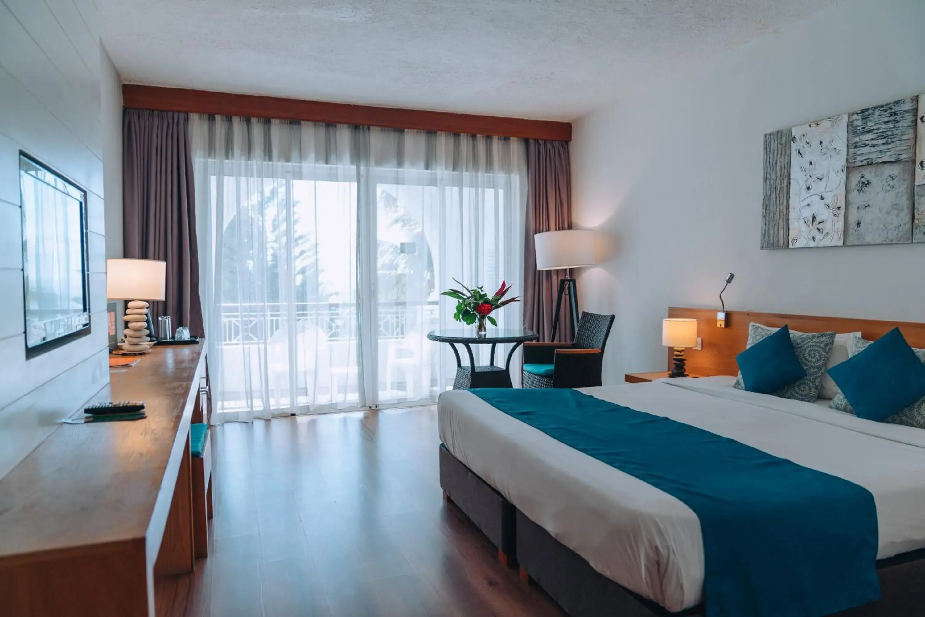 Bed in Casuarina Resort & Spa