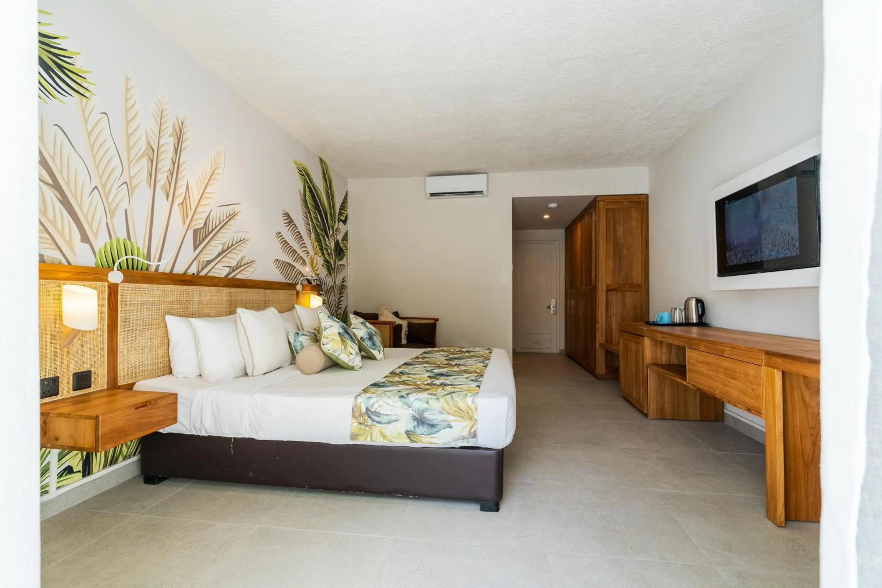 Photo of the whole room, Bed in Casuarina Resort and Spa