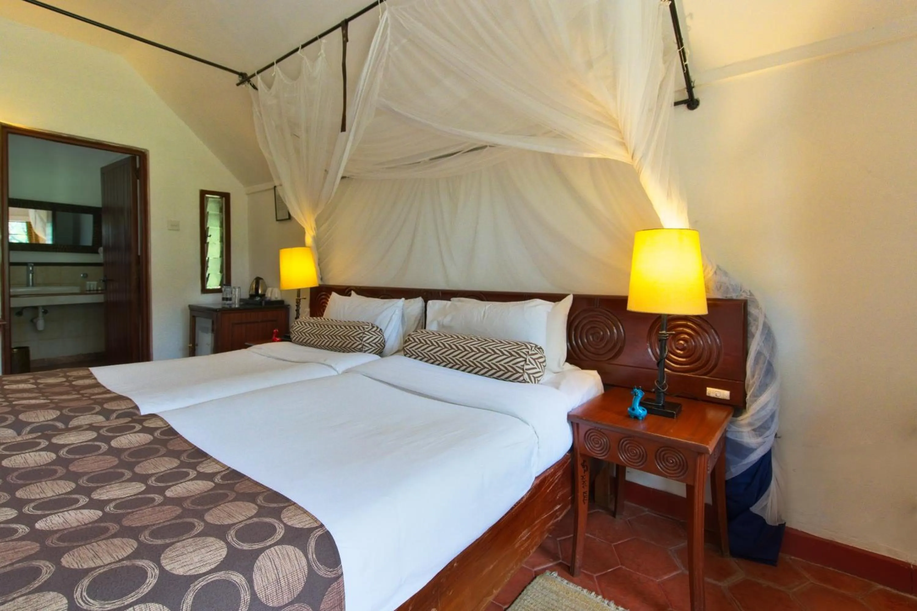 Bed in Muthu Keekorok Lodge, Maasai Mara, Narok