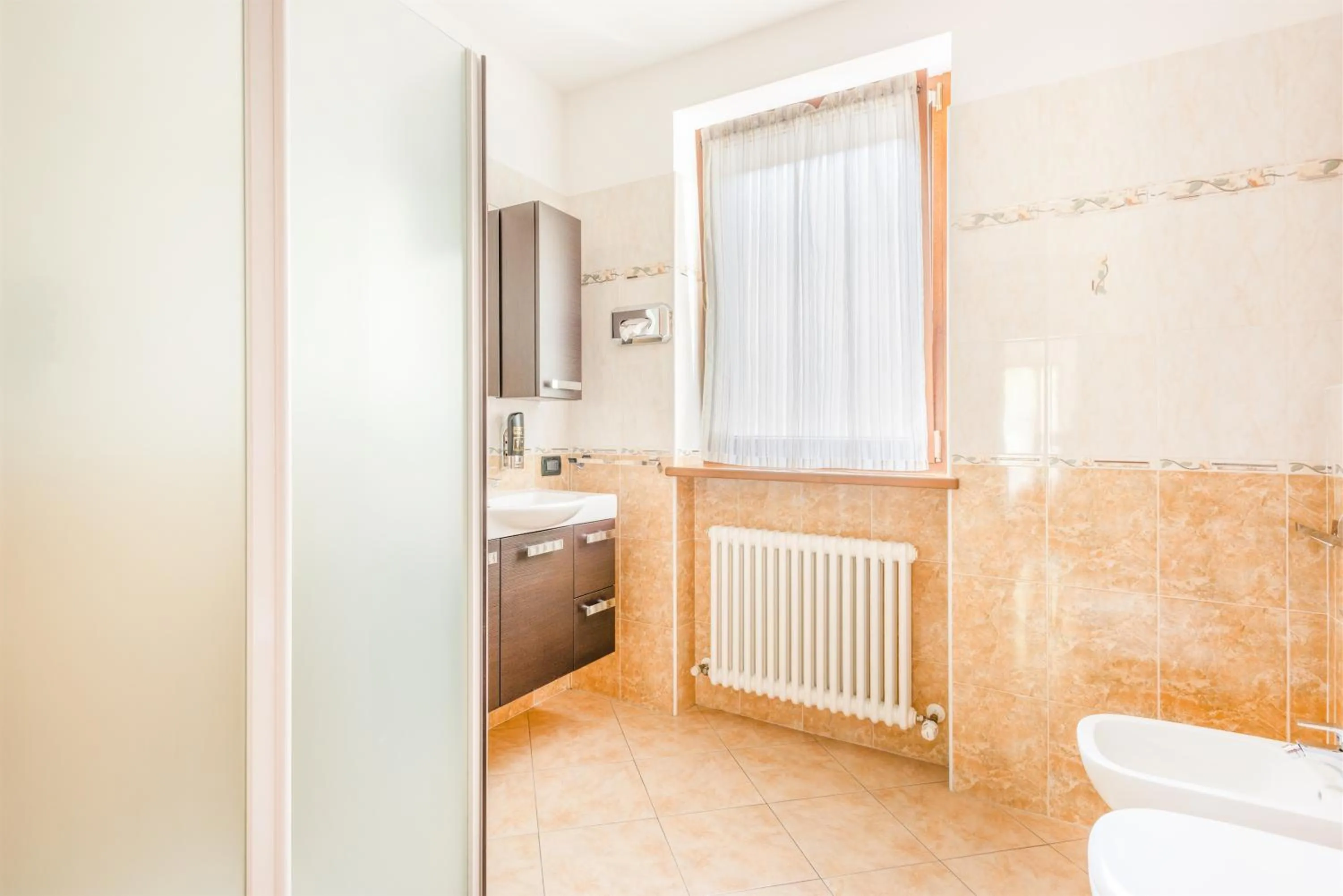 Bathroom in CROSINA HOLIDAY - Residence Toli