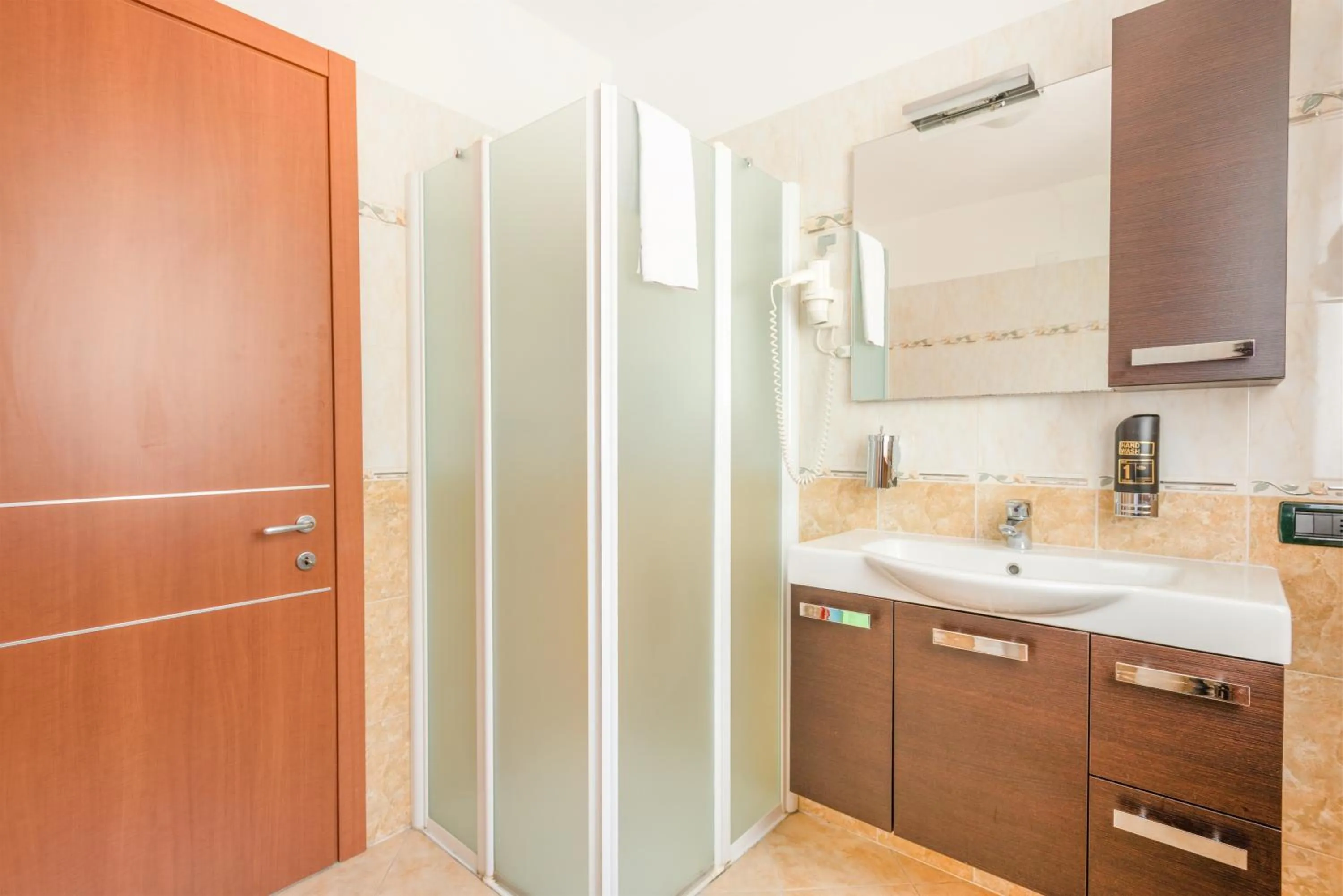 Bathroom in CROSINA HOLIDAY - Residence Toli