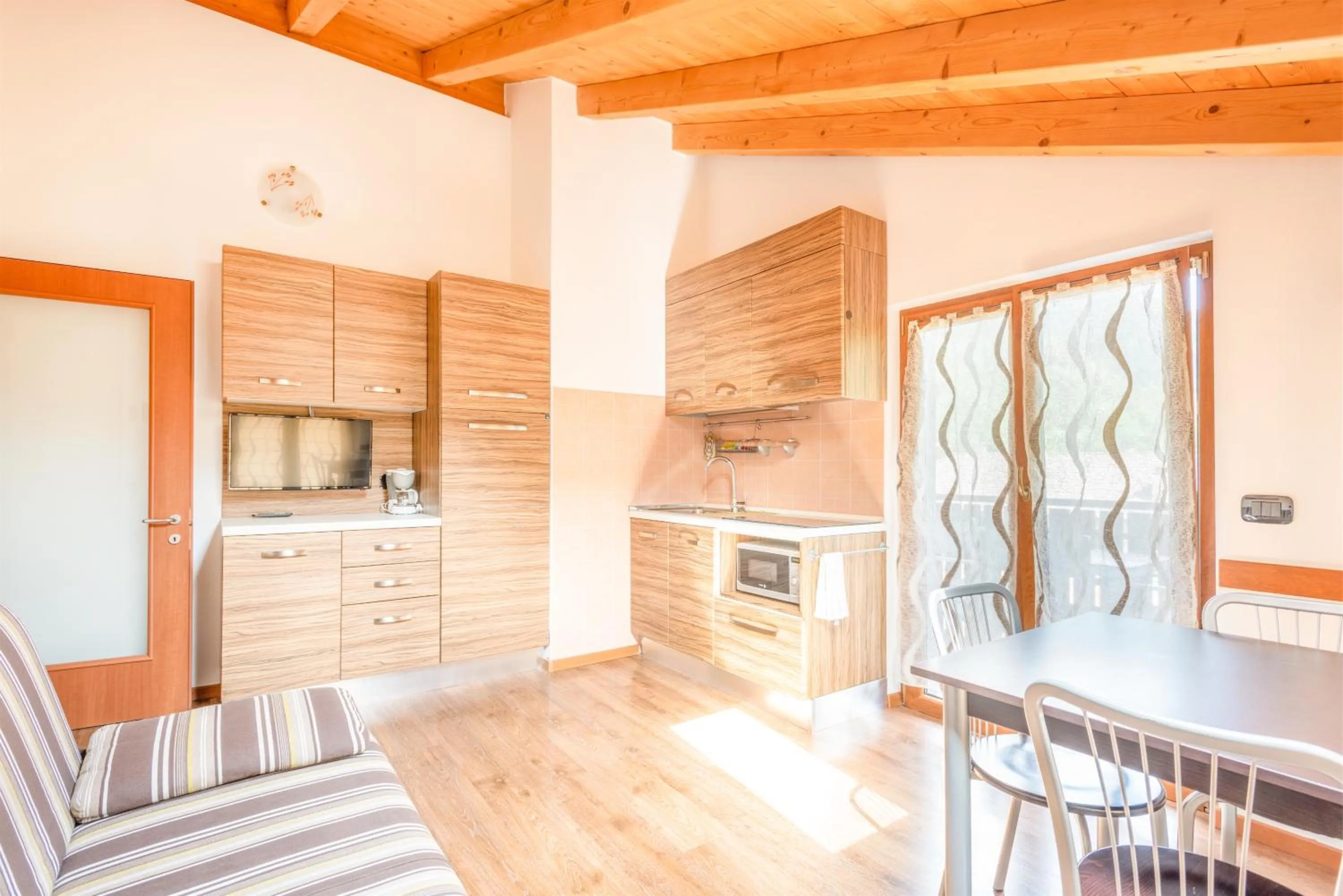Kitchen or kitchenette in CROSINA HOLIDAY - Residence Toli