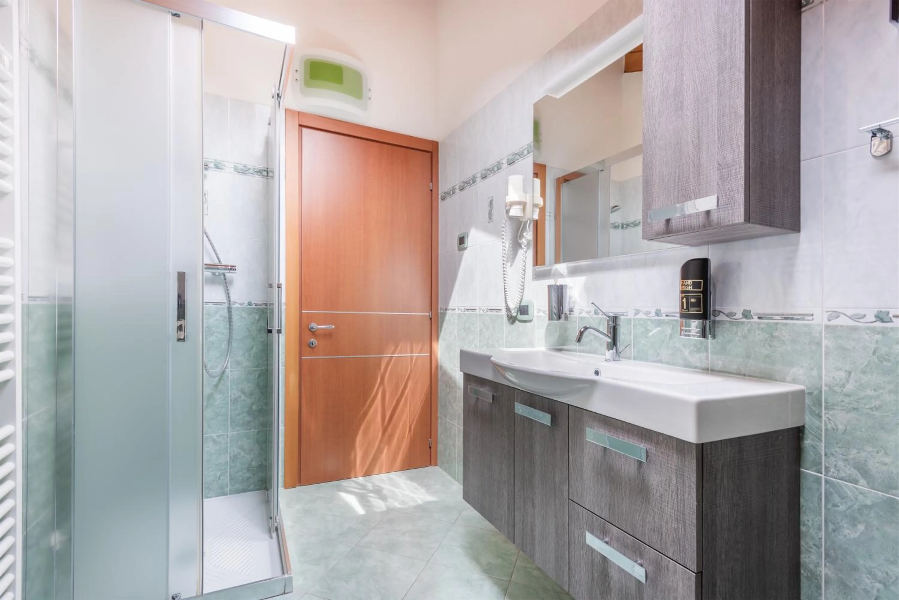 Bathroom in CROSINA HOLIDAY - Residence Toli