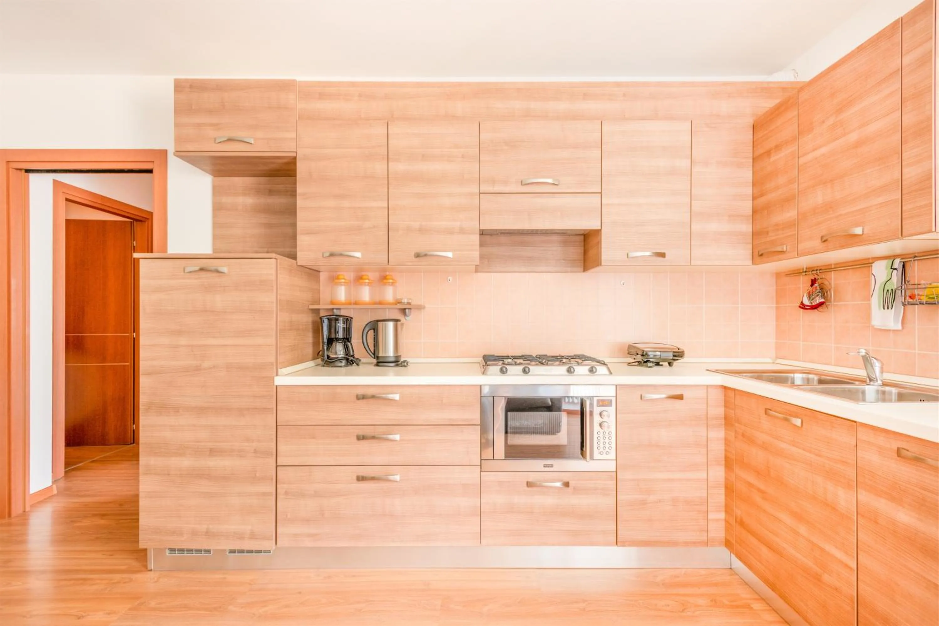 Kitchen or kitchenette in CROSINA HOLIDAY - Residence Toli