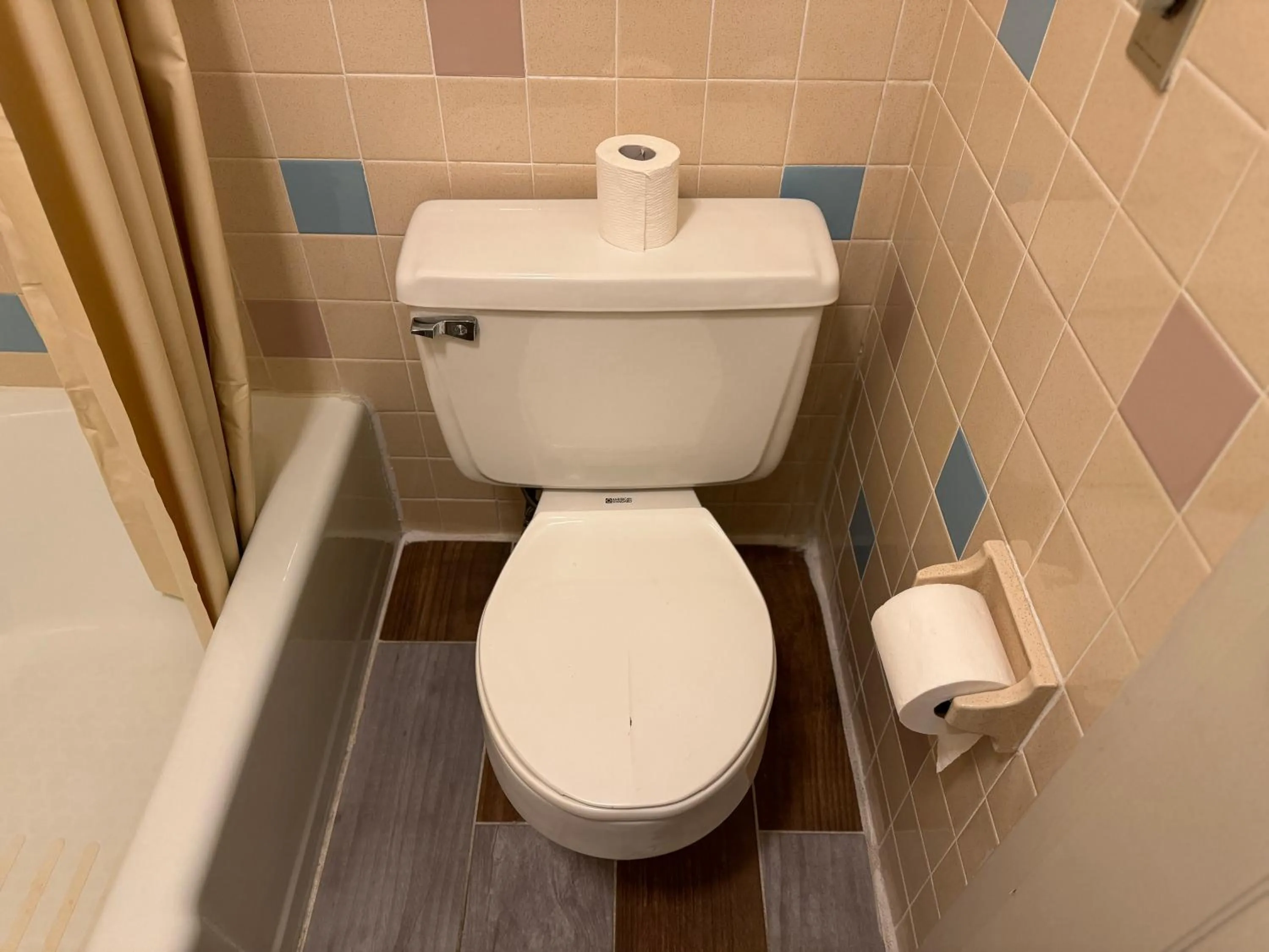 Toilet in Country Club Inn & Suites