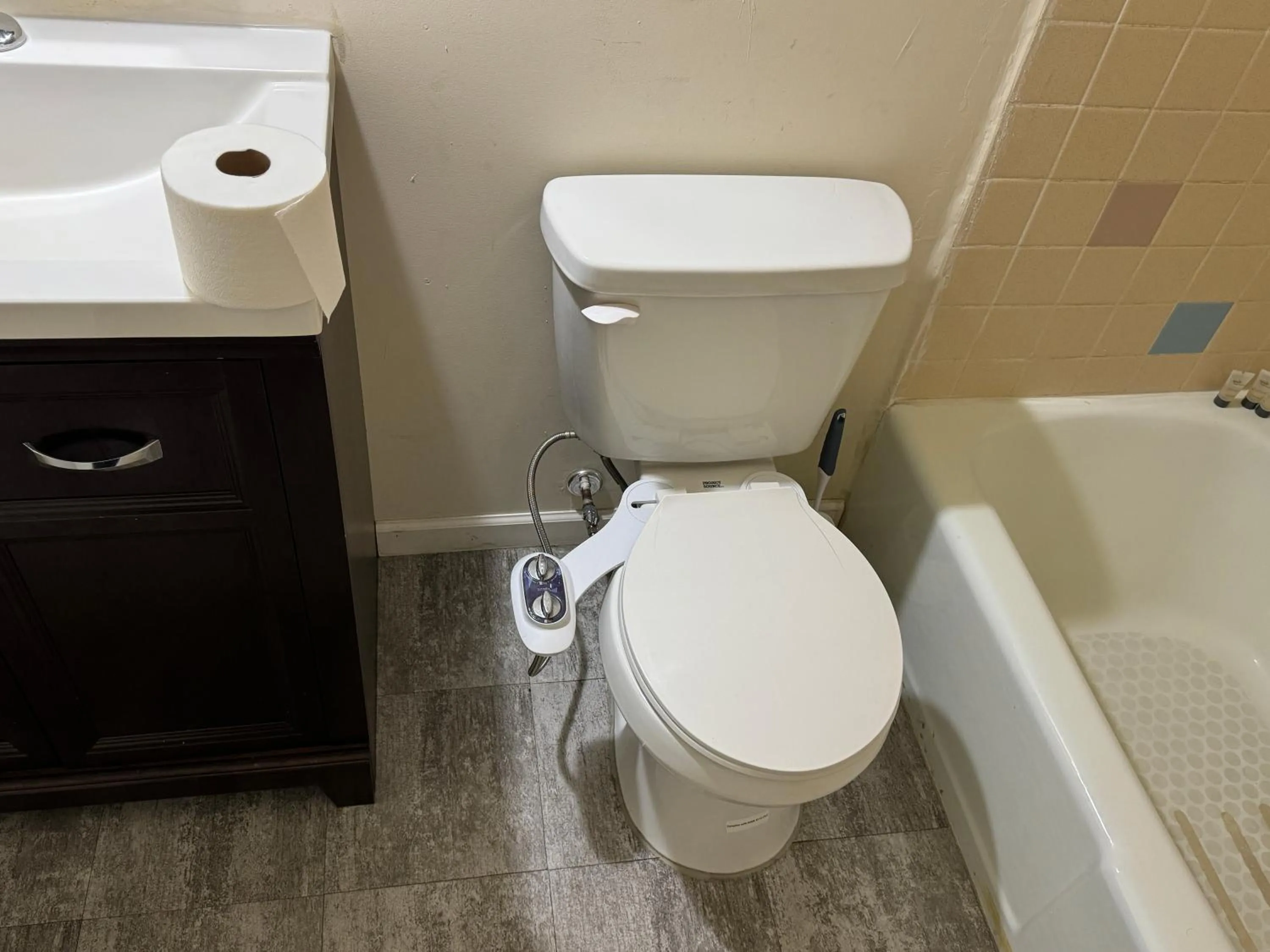 Toilet in Country Club Inn & Suites