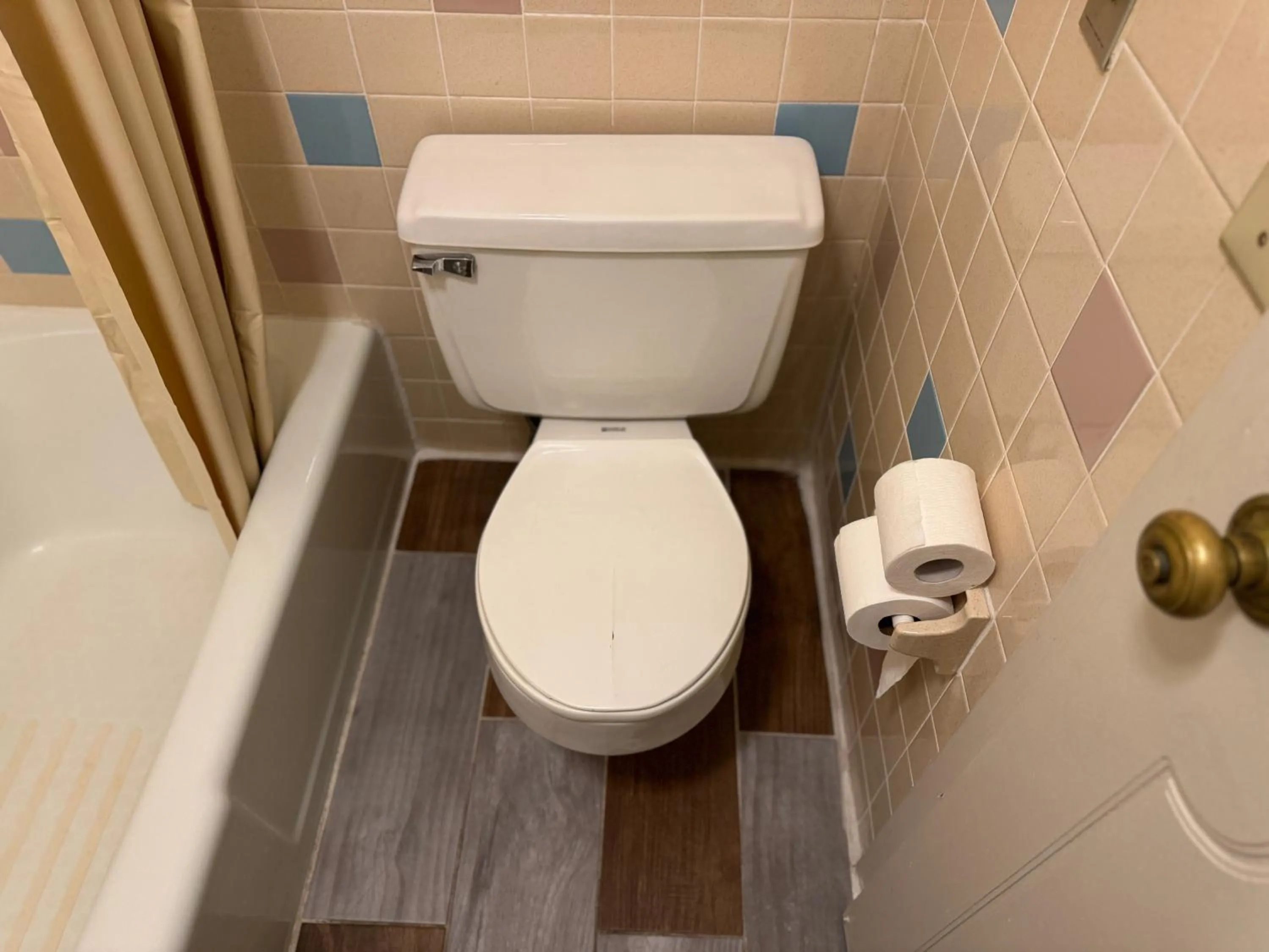 Toilet in Country Club Inn & Suites