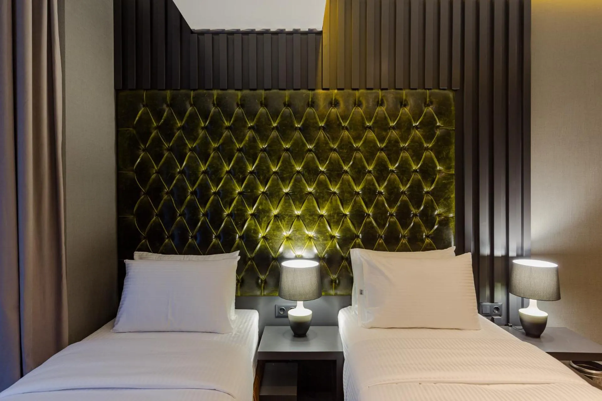 Bed in Tapis Rouge Design Boutique Hotel