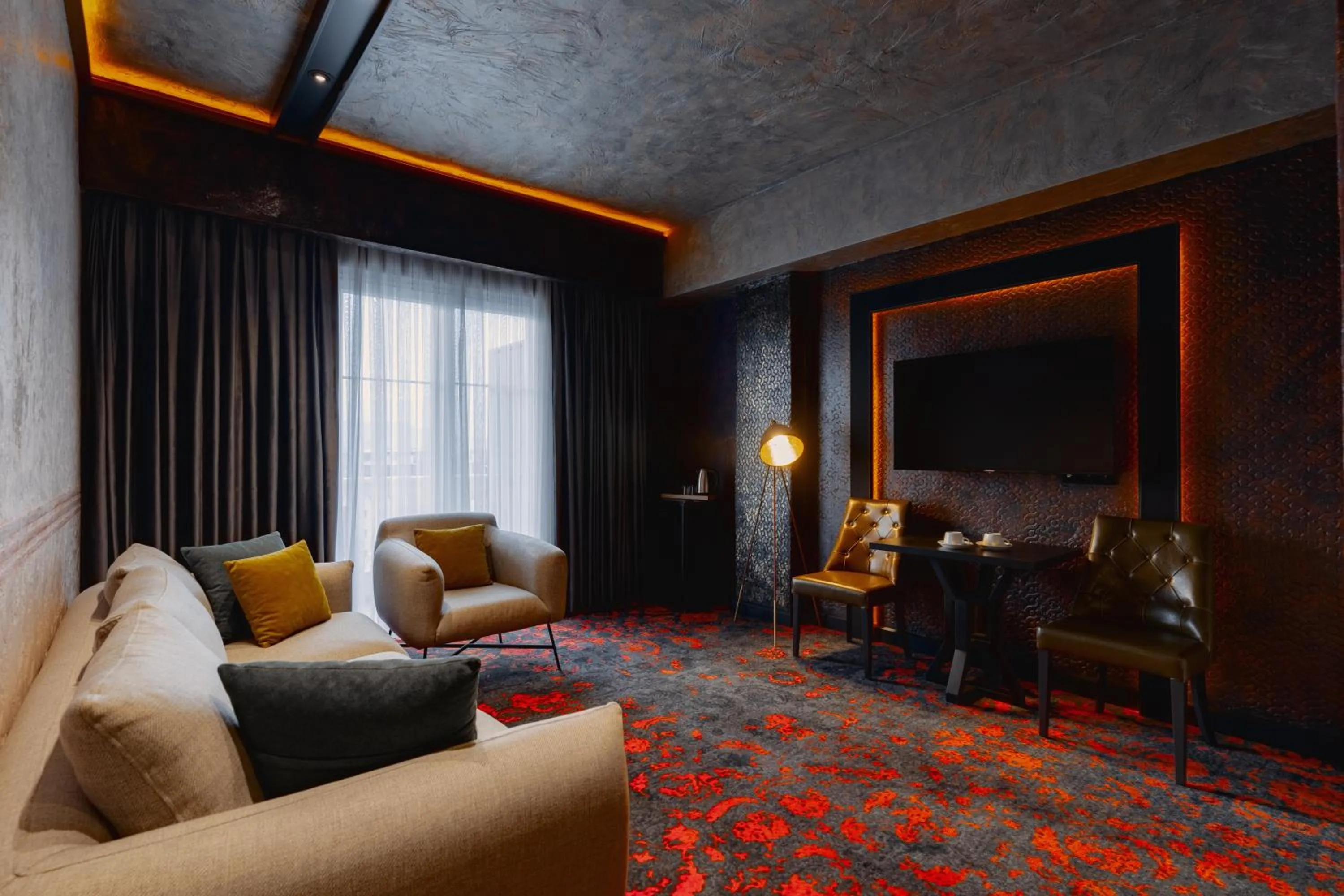 Seating area in Tapis Rouge Design Boutique Hotel