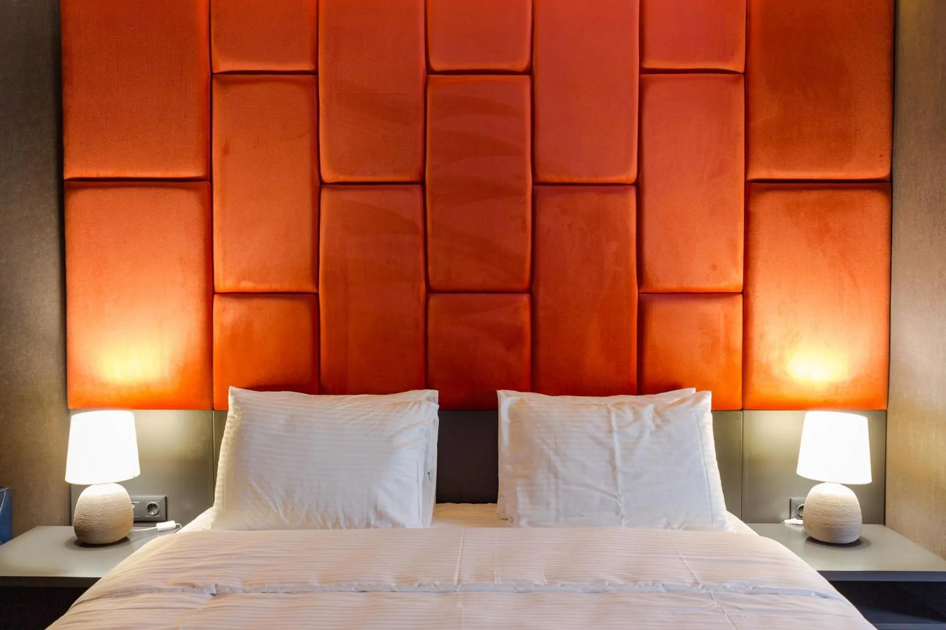 Bed in Tapis Rouge Design Boutique Hotel