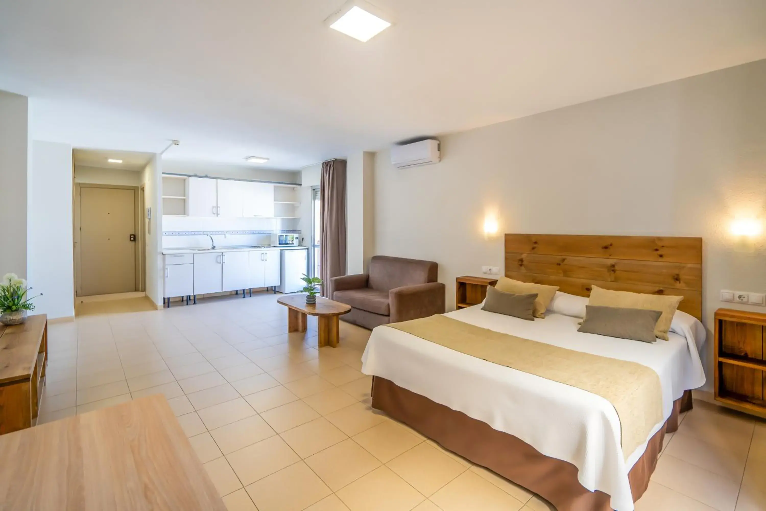 Photo of the whole room, Bed in Apartamentos Puerta del Sur Photo of the whole room, Bed in Apartamentos Puerta del Sur