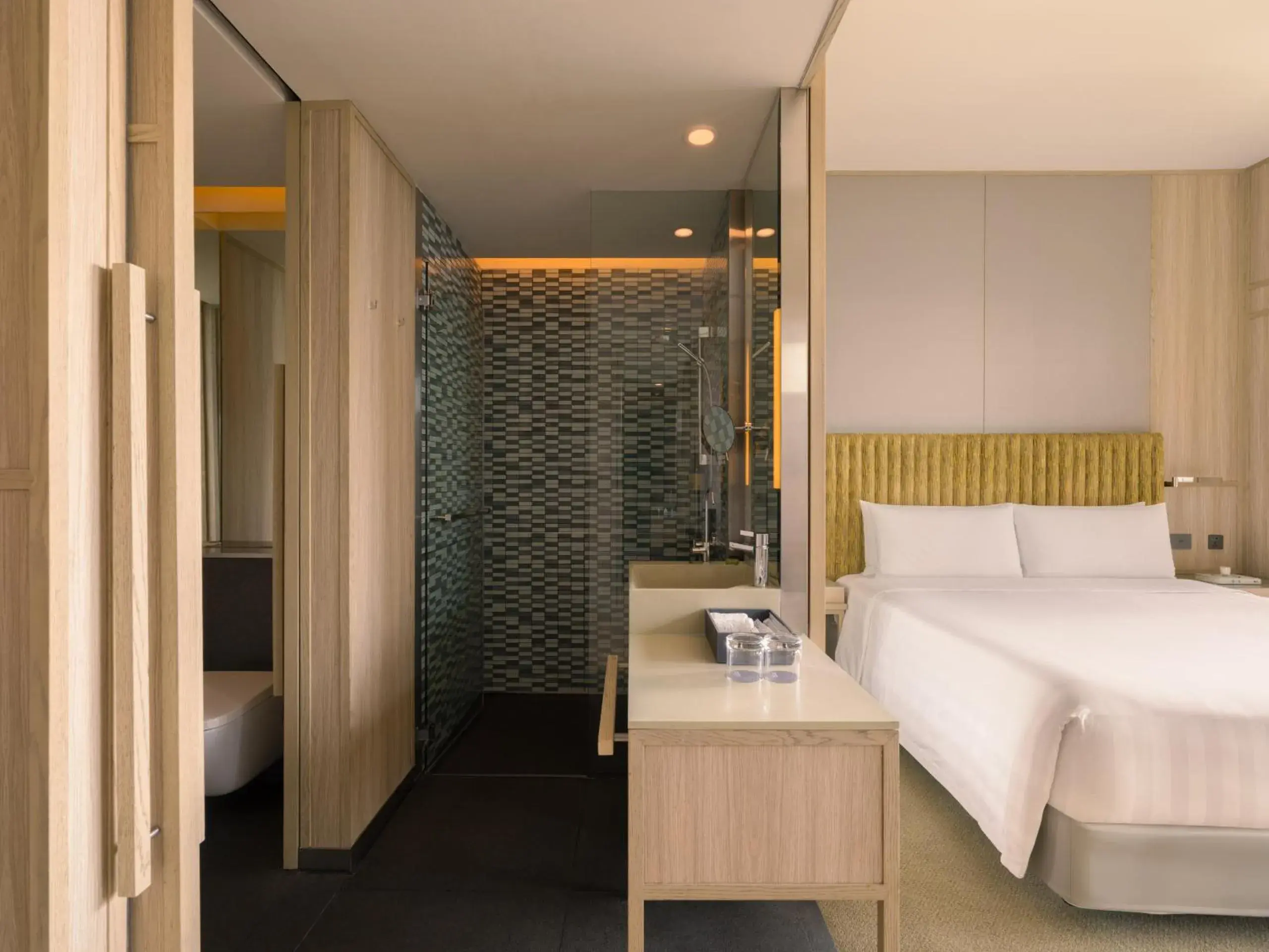 Toilet, Bed in PARKROYAL COLLECTION Pickering, Singapore Toilet, Bed in PARKROYAL COLLECTION Pickering, Singapore