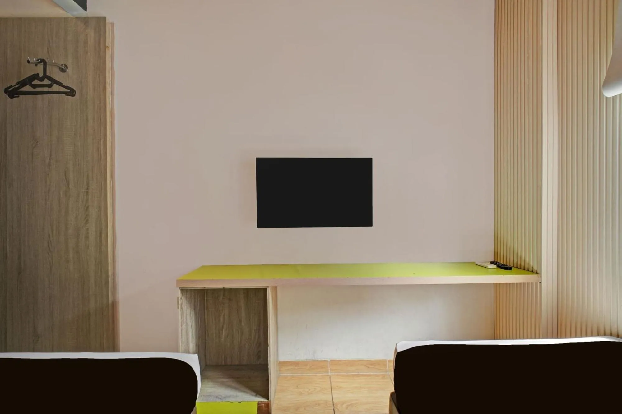 TV and multimedia in Hotel O Gambir Near Juanda Station Formerly Bunga Dahlia