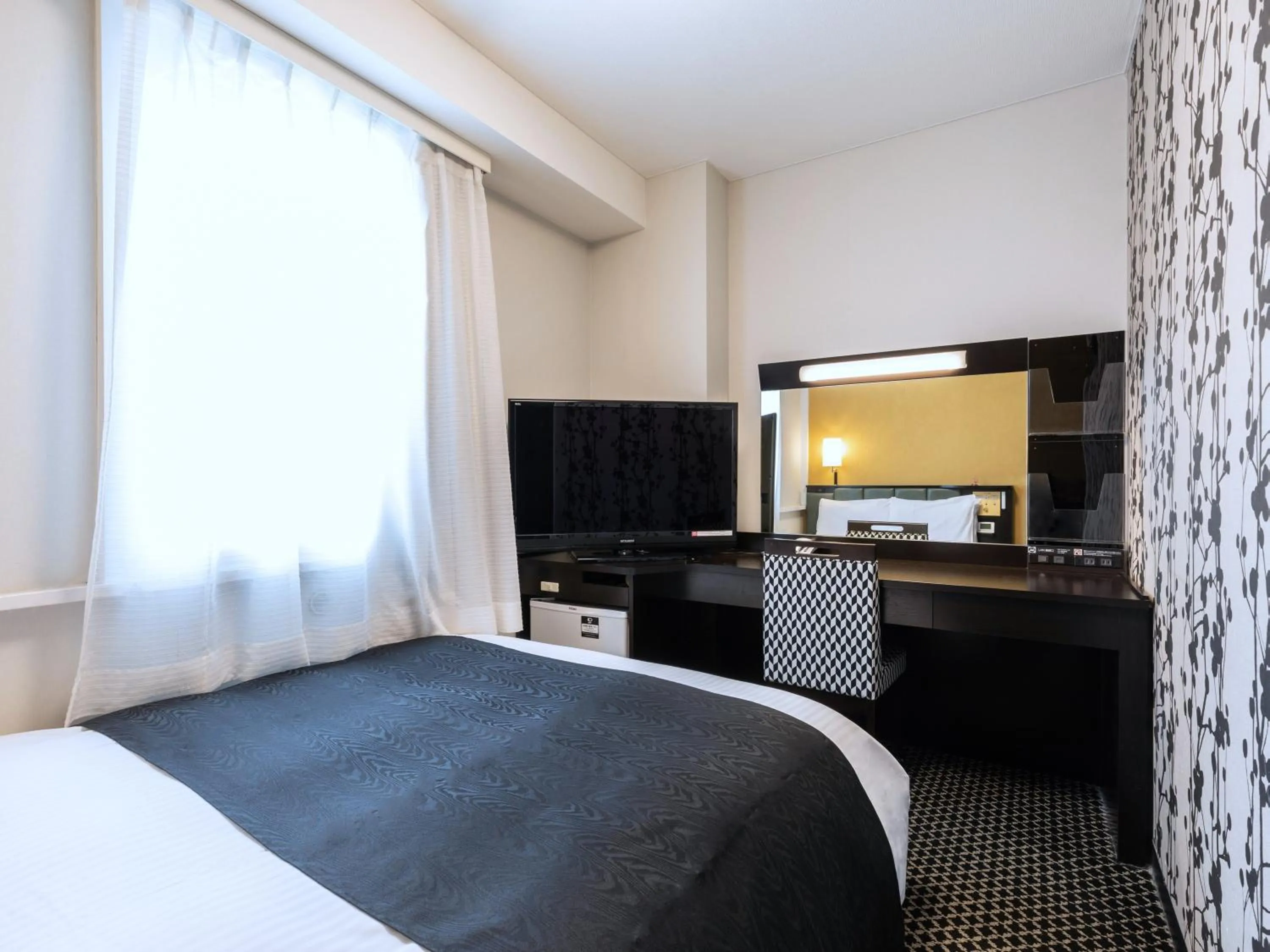 Photo of the whole room, Bed in APA Hotel Sapporo Susukino Ekimae