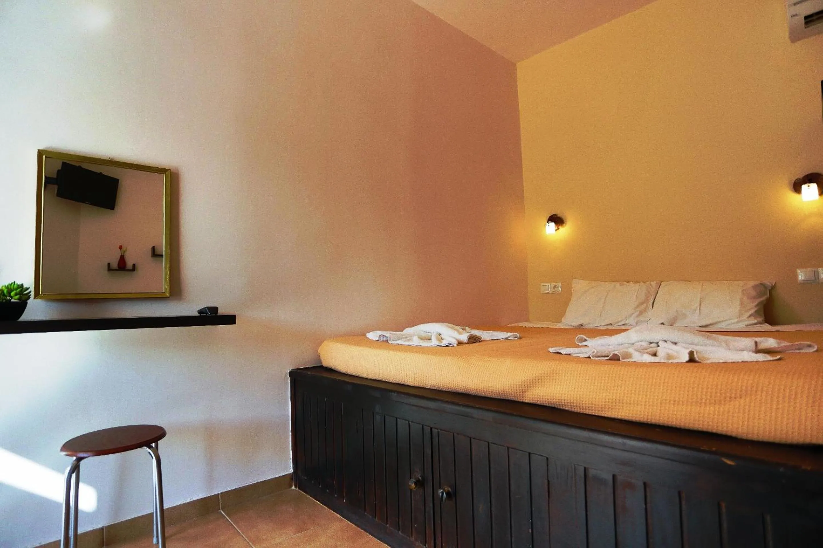 Bed in Little Lindos Sea View Studios