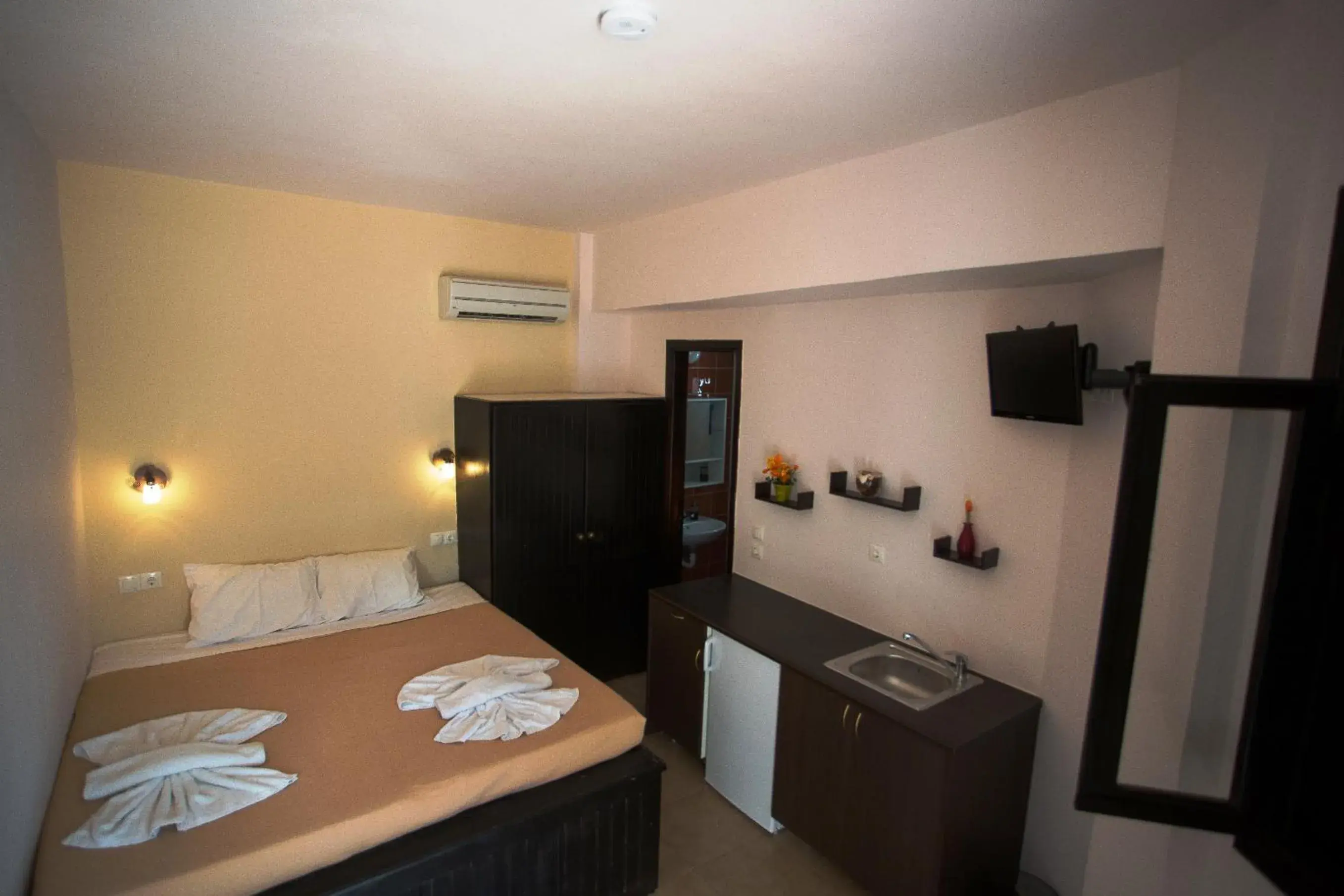 Bed in Little Lindos Sea View Studios Bed in Little Lindos Sea View Studios