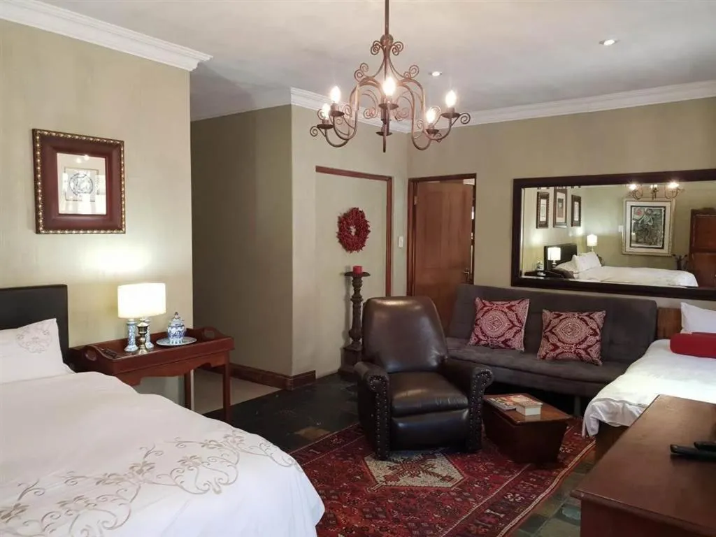 Seating area, Bed in The Lemon Tree Self- Catering