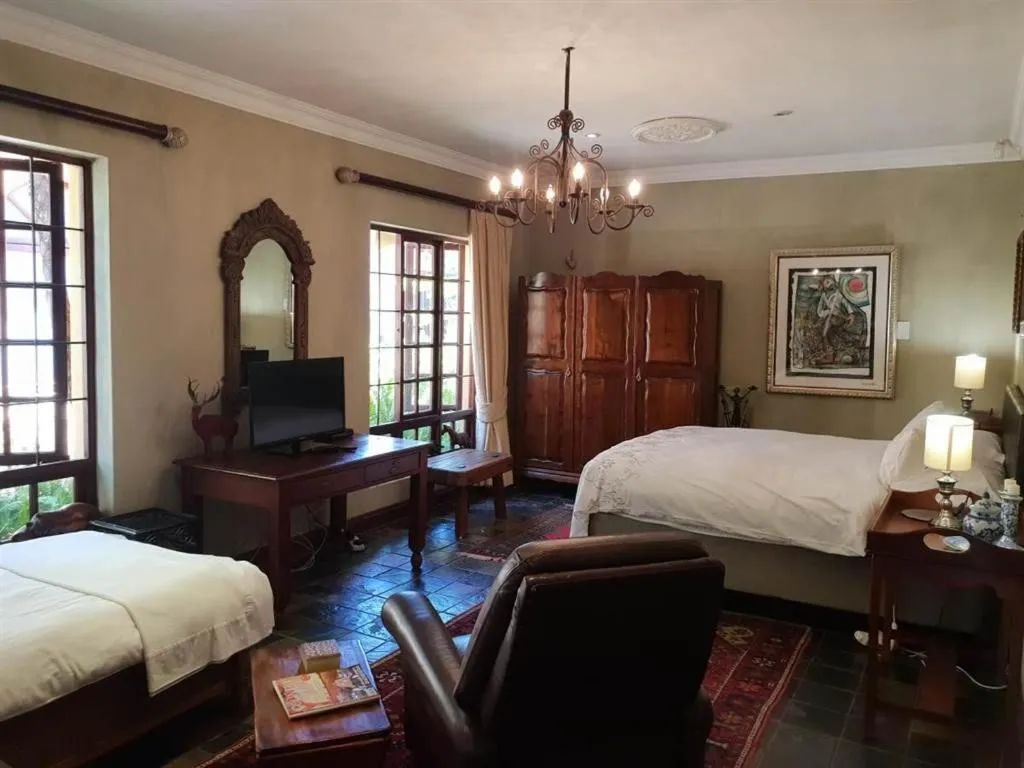 Seating area, Bed in The Lemon Tree Self- Catering