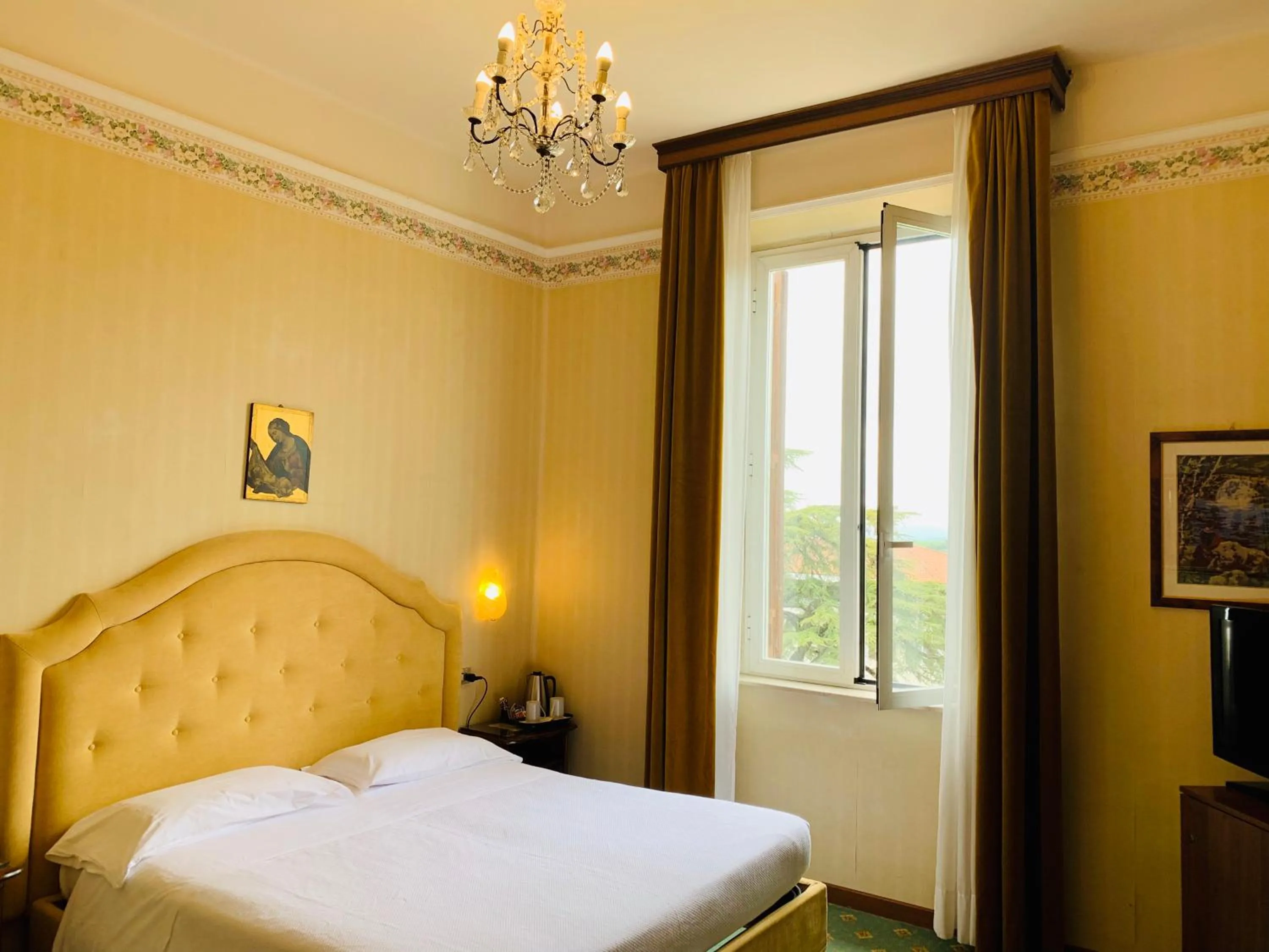 Bed in Grand Hotel Excelsior