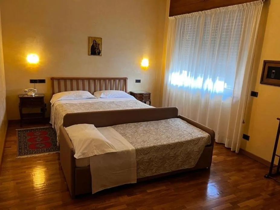 Bed in Grand Hotel Excelsior