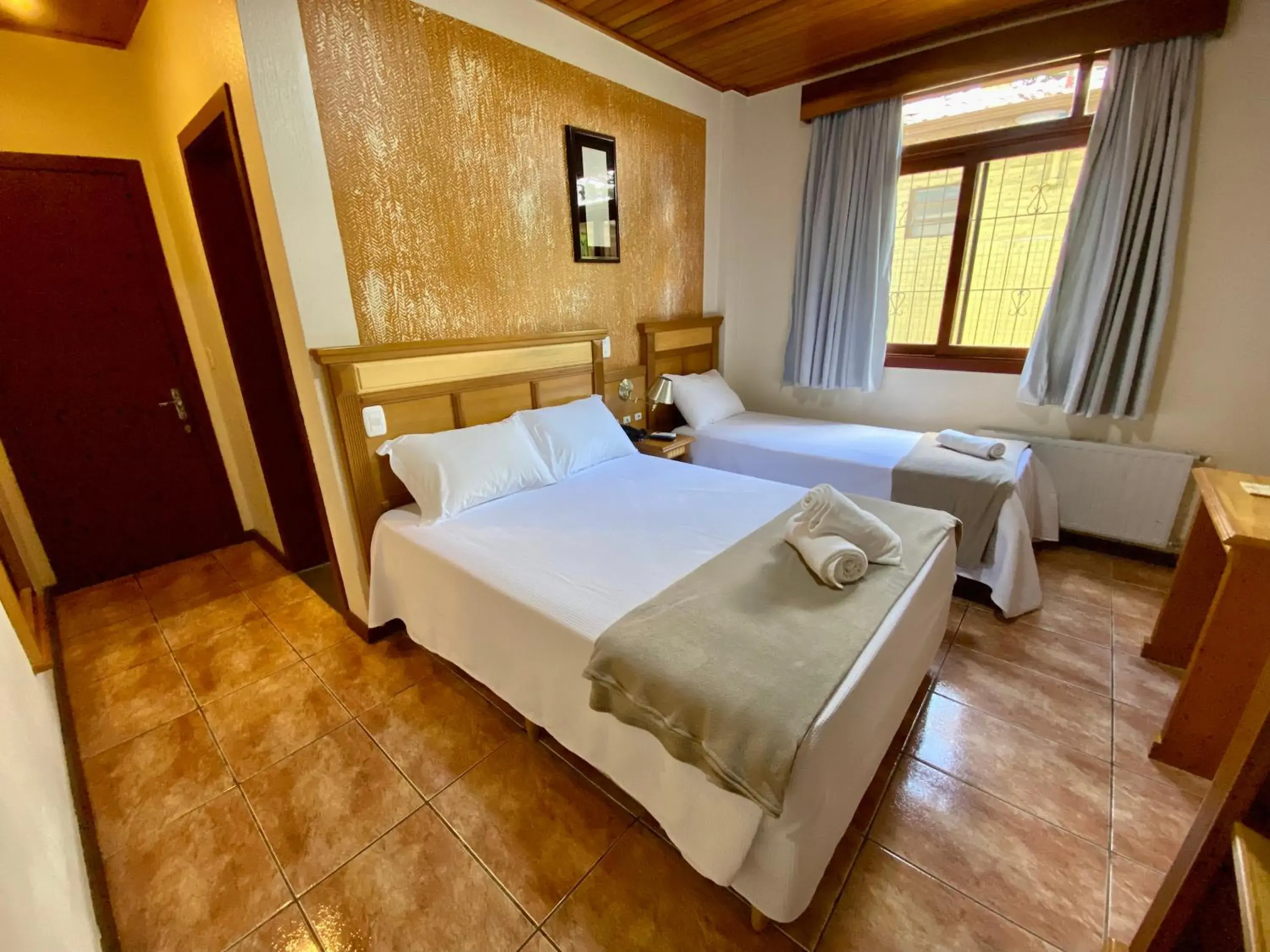 Luxury Triple Room in Pousada Gramado Luxury Triple Room in Pousada Gramado