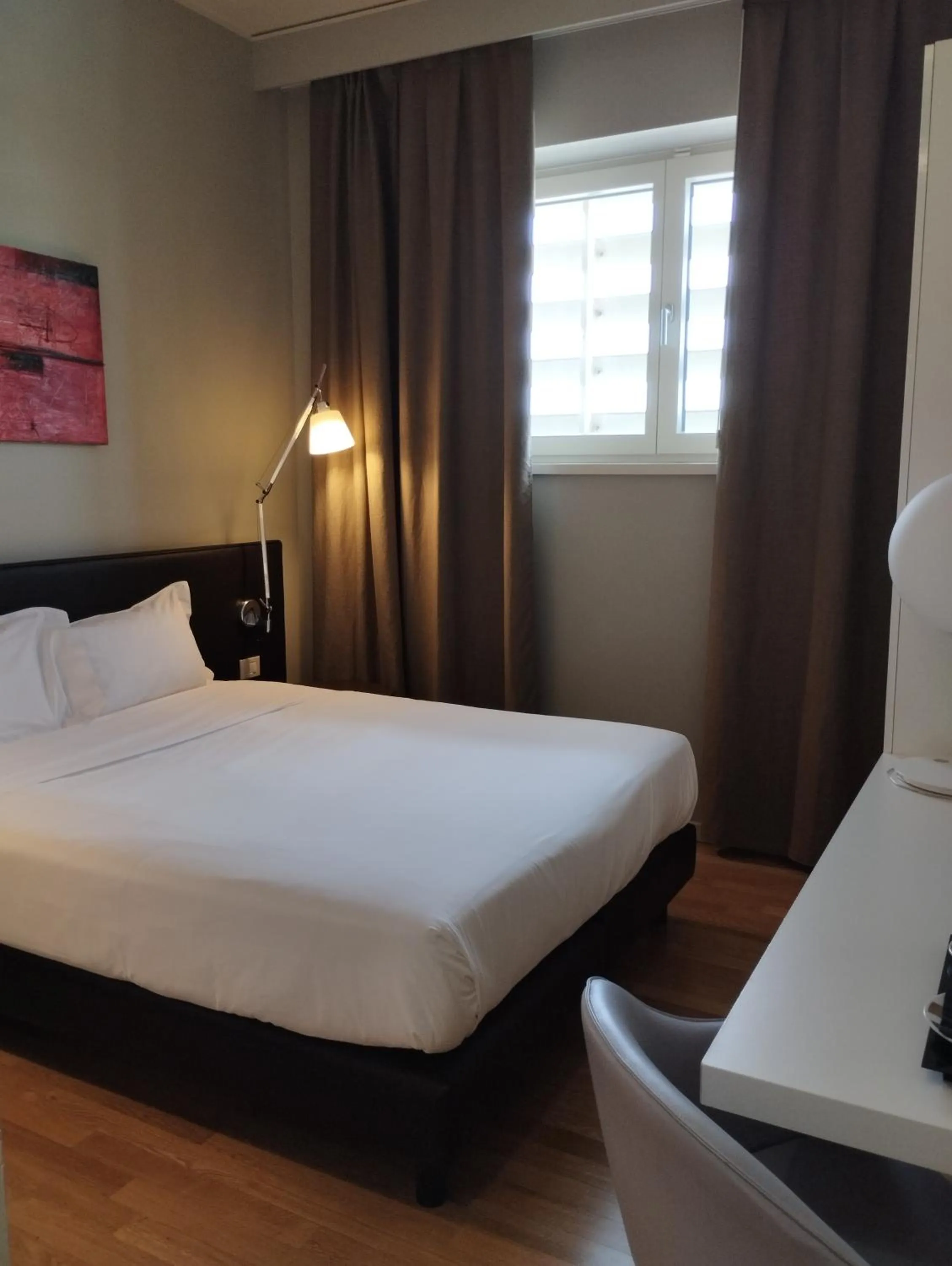 Bed in Boiardo Hotel