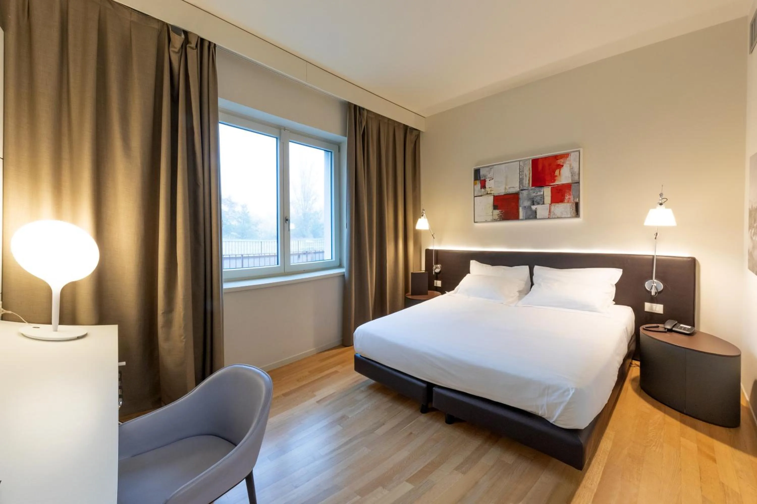 Bed in Boiardo Hotel