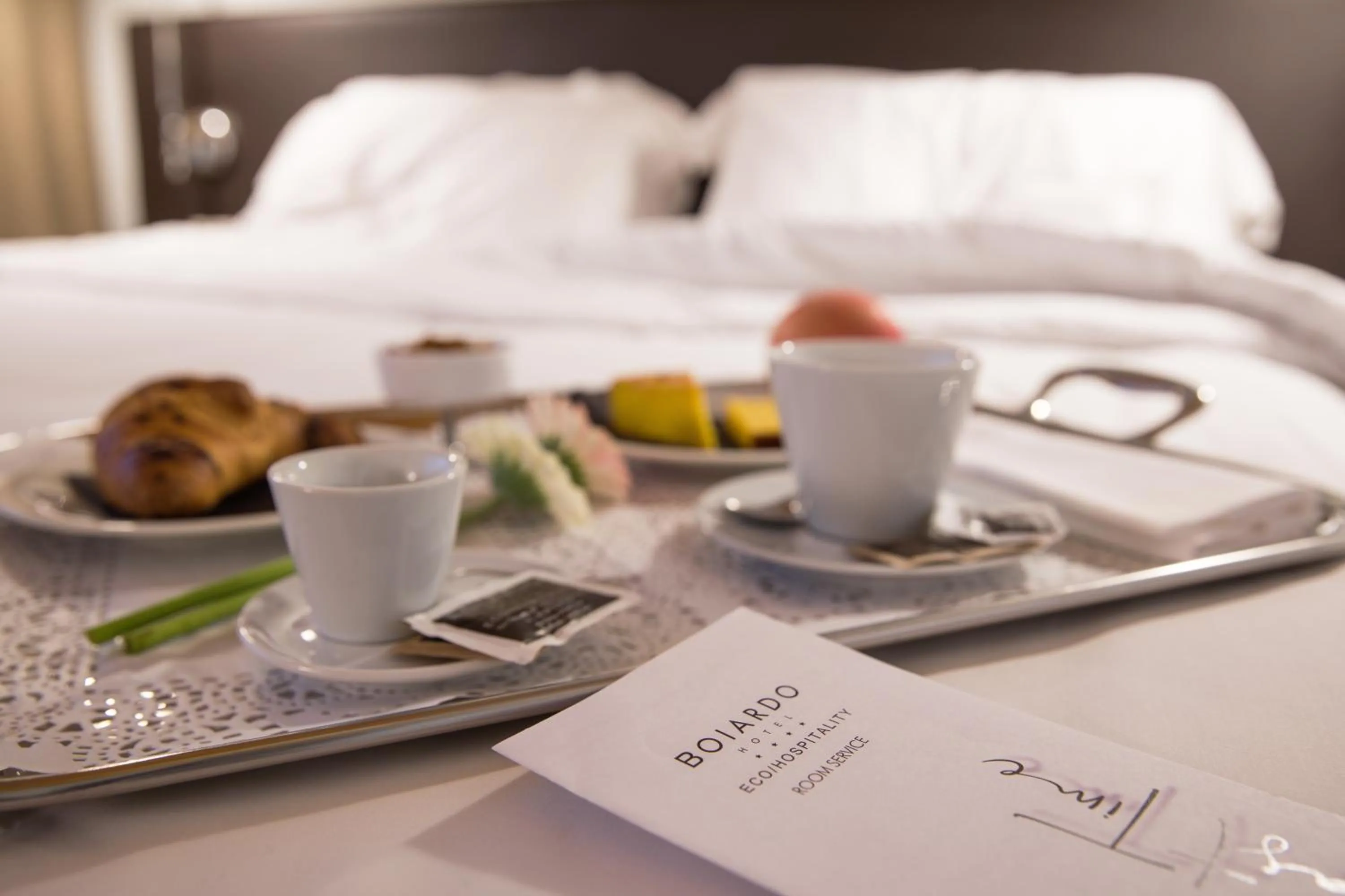 Bed in Boiardo Hotel