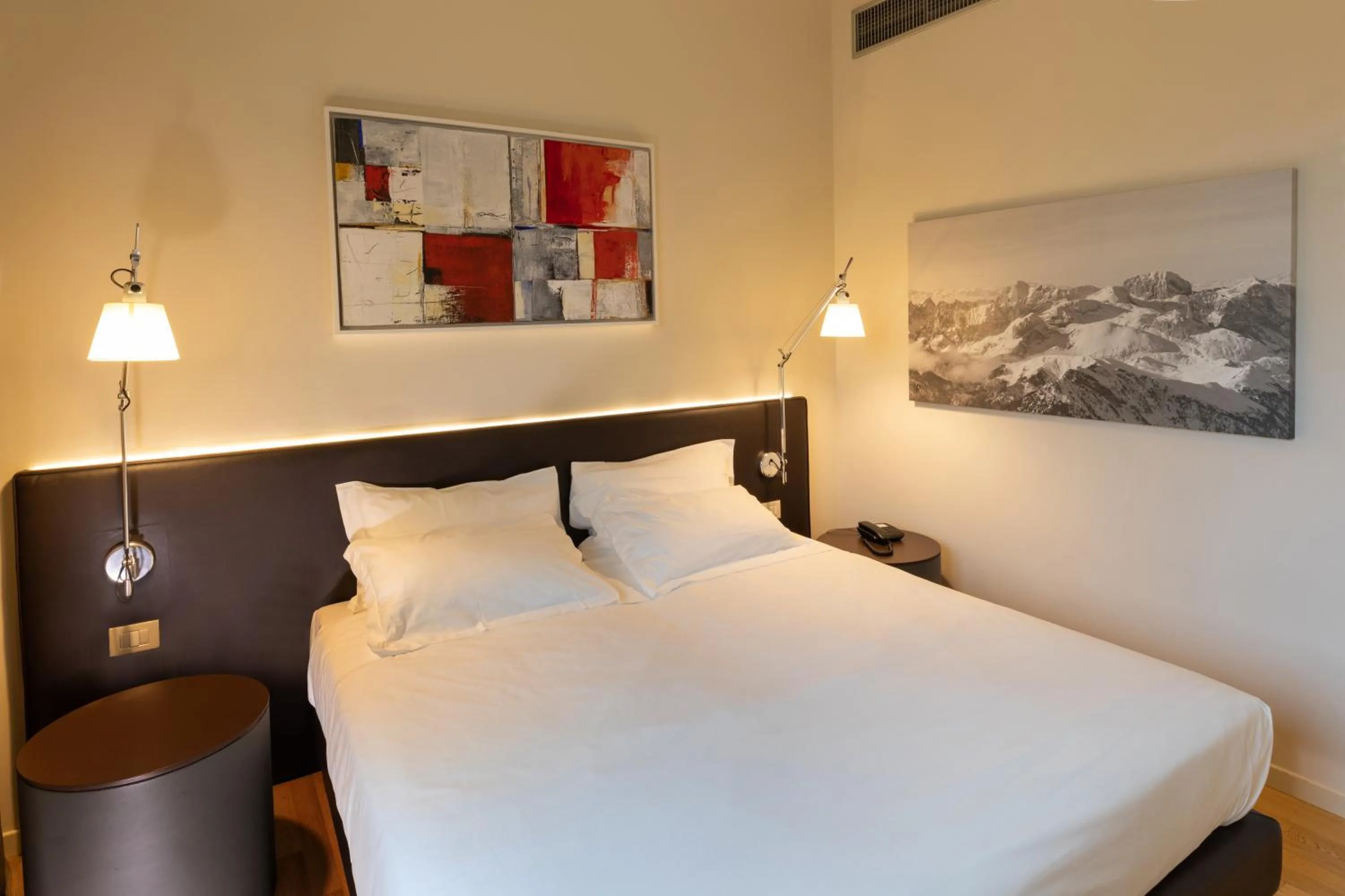 Bed in Boiardo Hotel