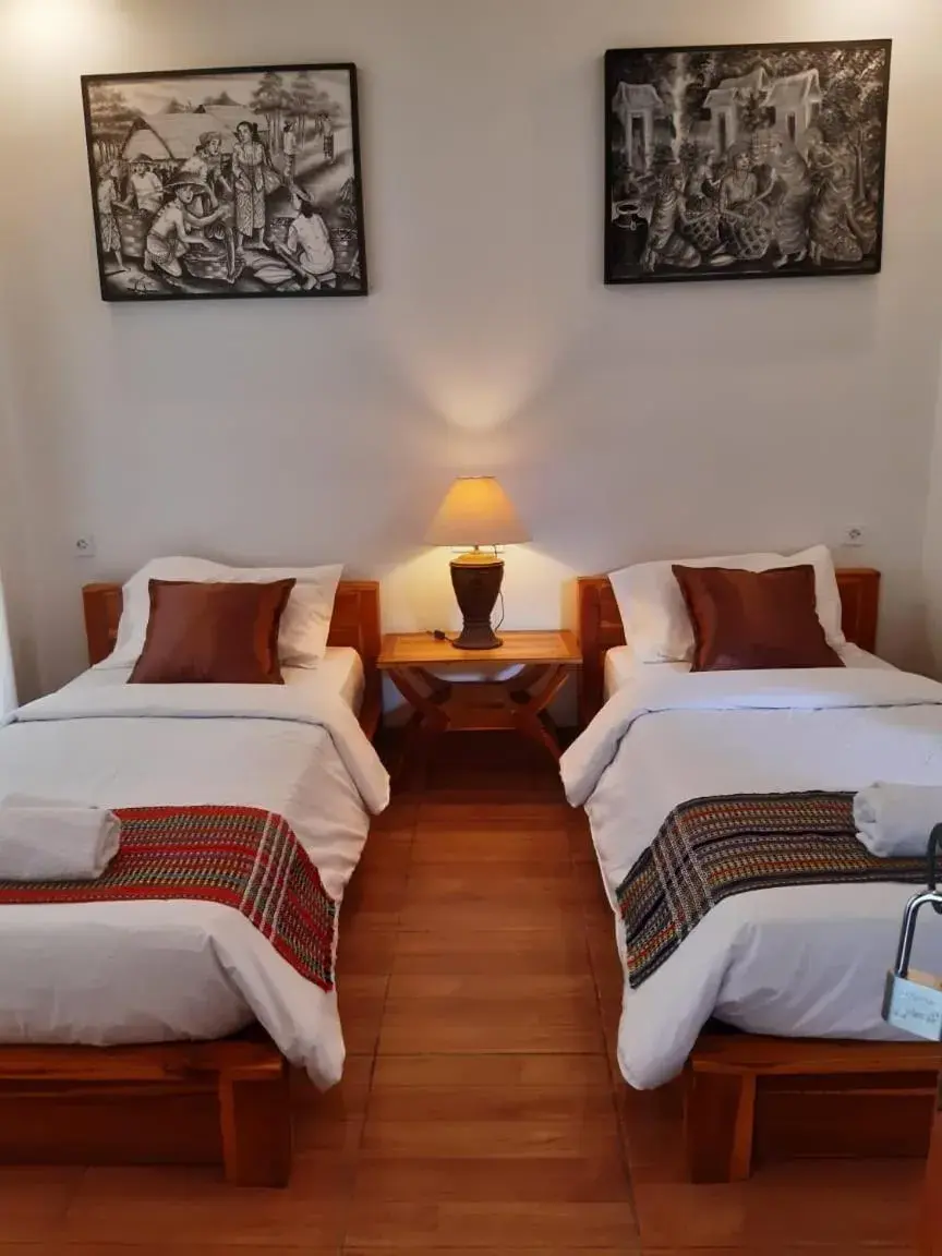 Bed in Tiis Garden Puri Villas Bed in Tiis Garden Puri Villas