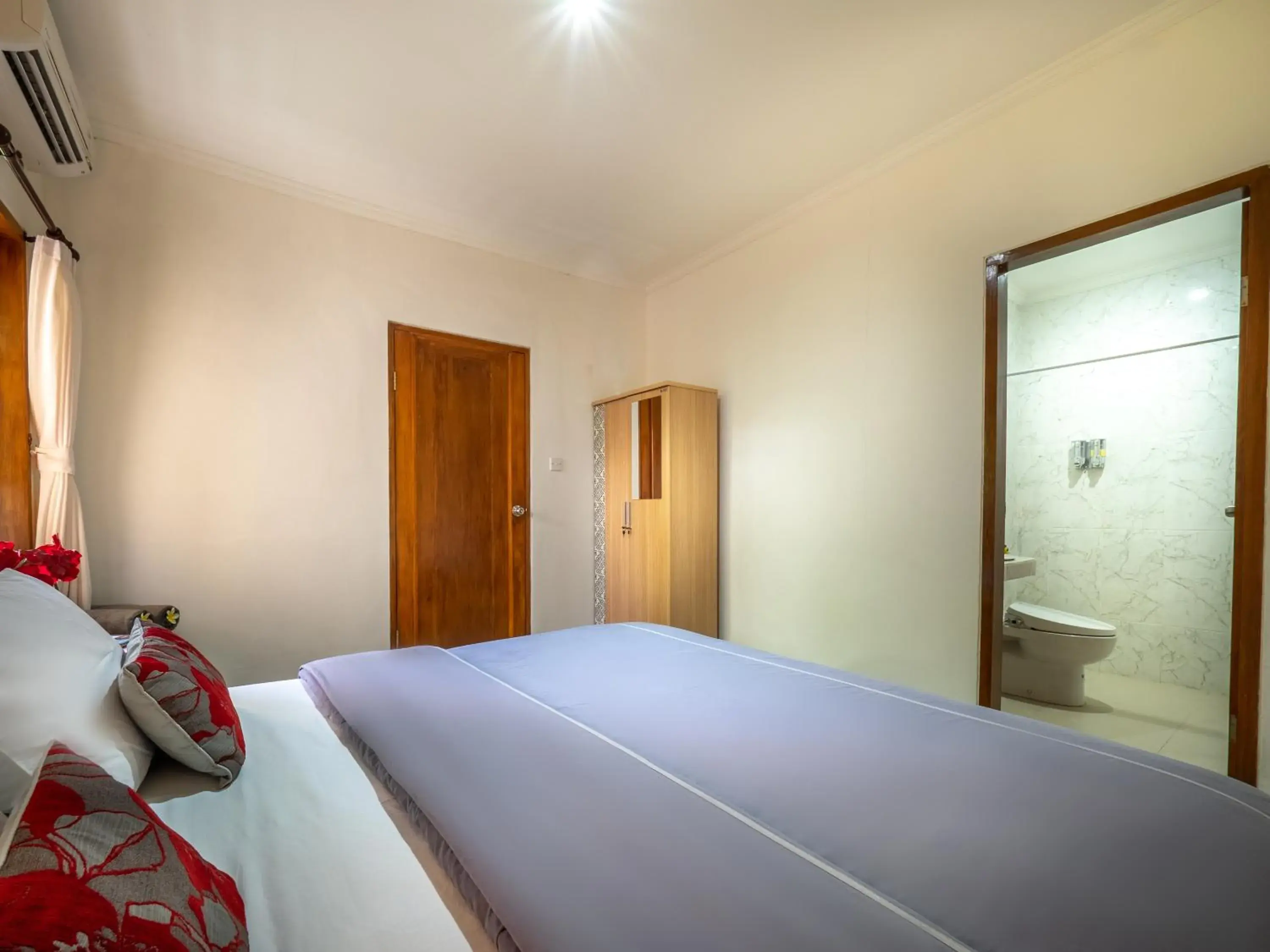 Bed in Tiis Garden Puri Villas Bed in Tiis Garden Puri Villas