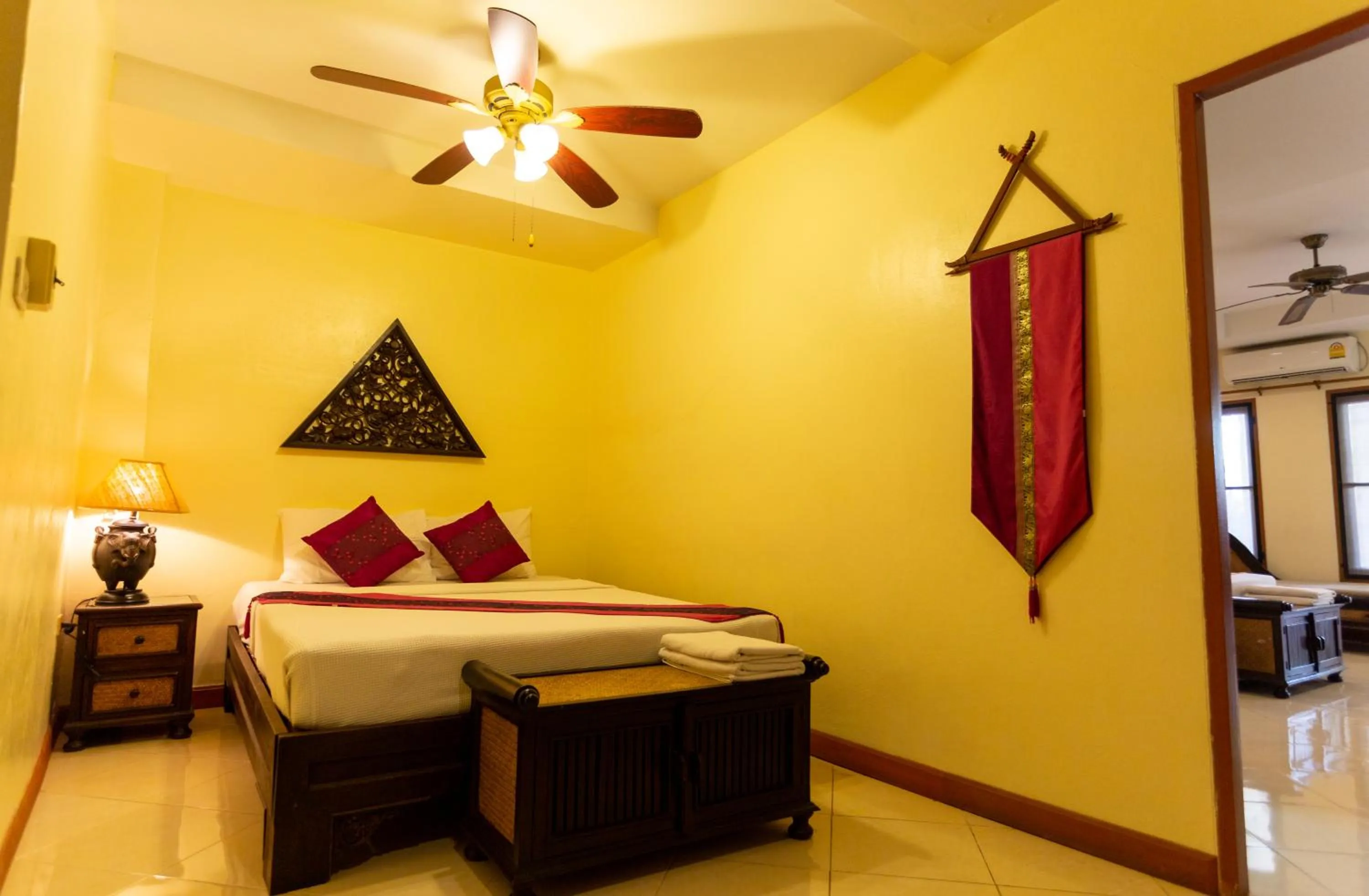 Bed in Chang Charlie Inn, Boutique