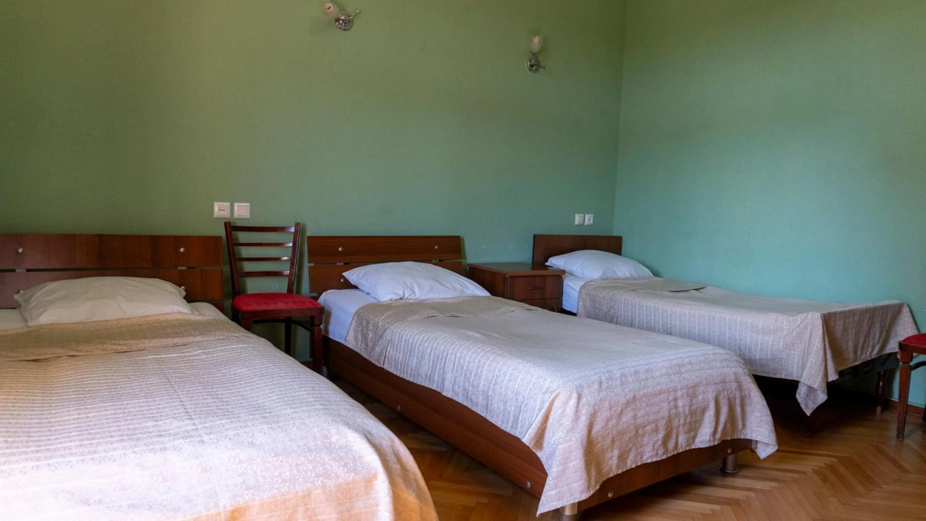 Bed in Galavnis Kari Hotel