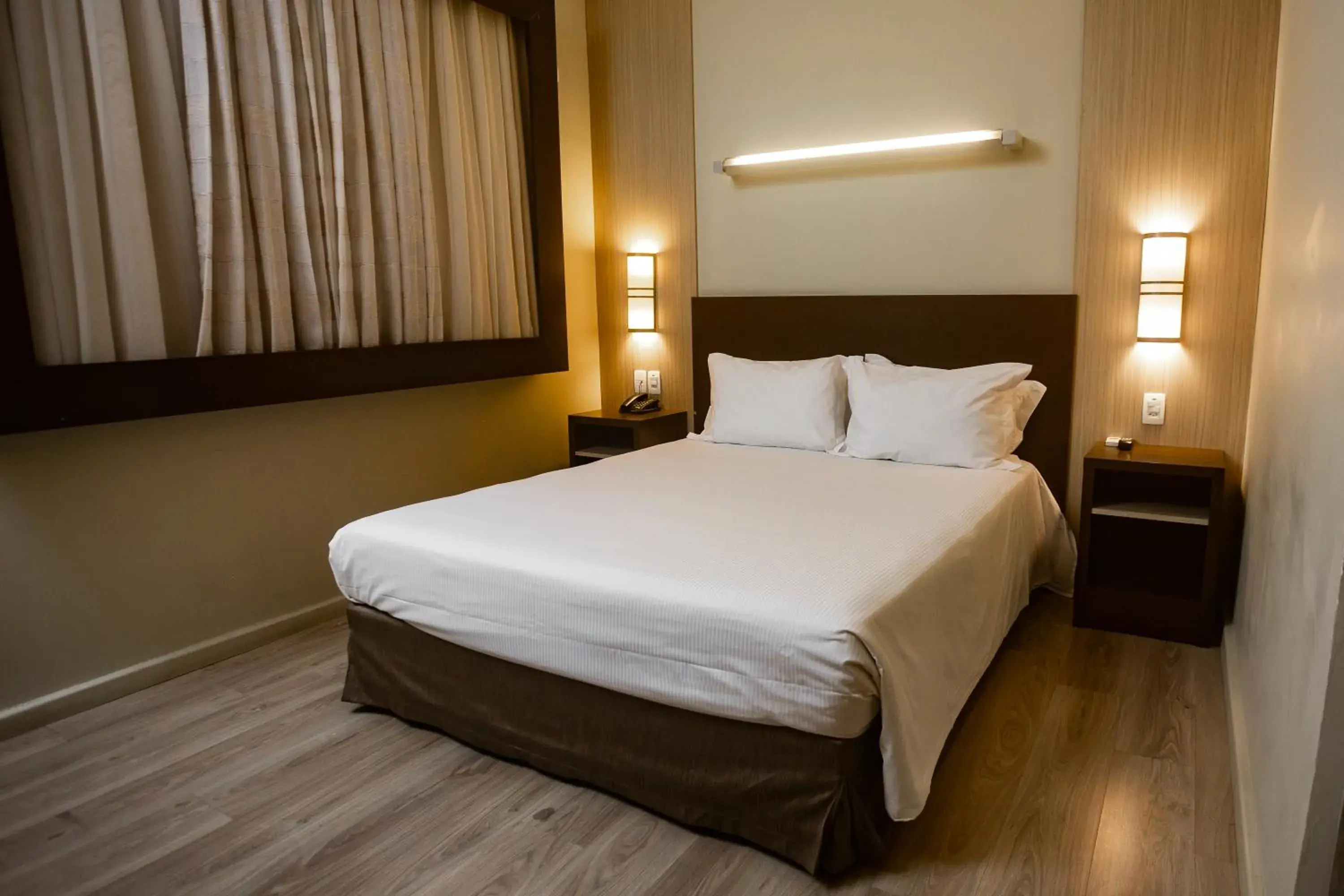 Bed in Master Cosmopolitan Moinhos de Vento Bed in Master Cosmopolitan Moinhos de Vento