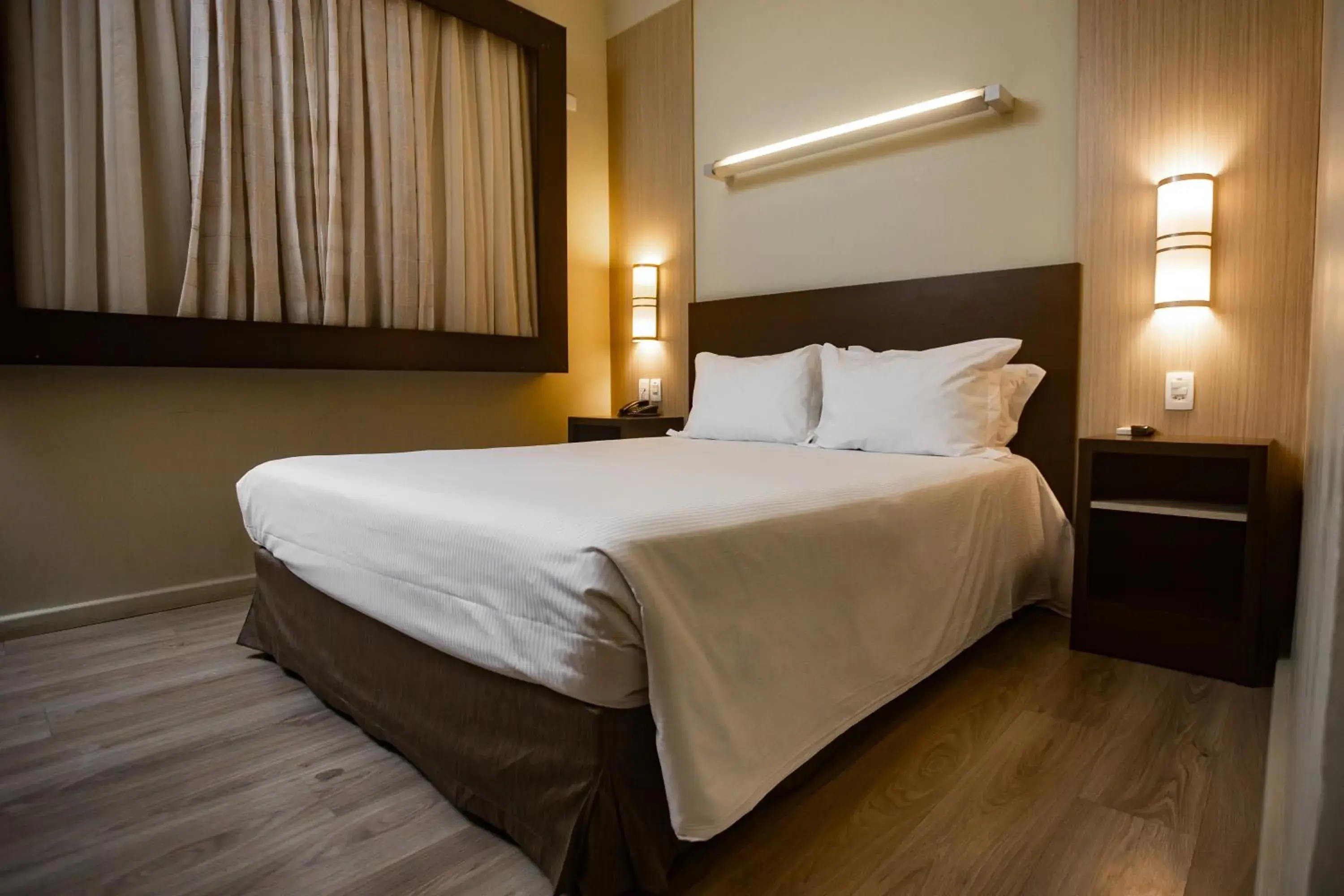 Bed in Master Cosmopolitan Moinhos de Vento Bed in Master Cosmopolitan Moinhos de Vento