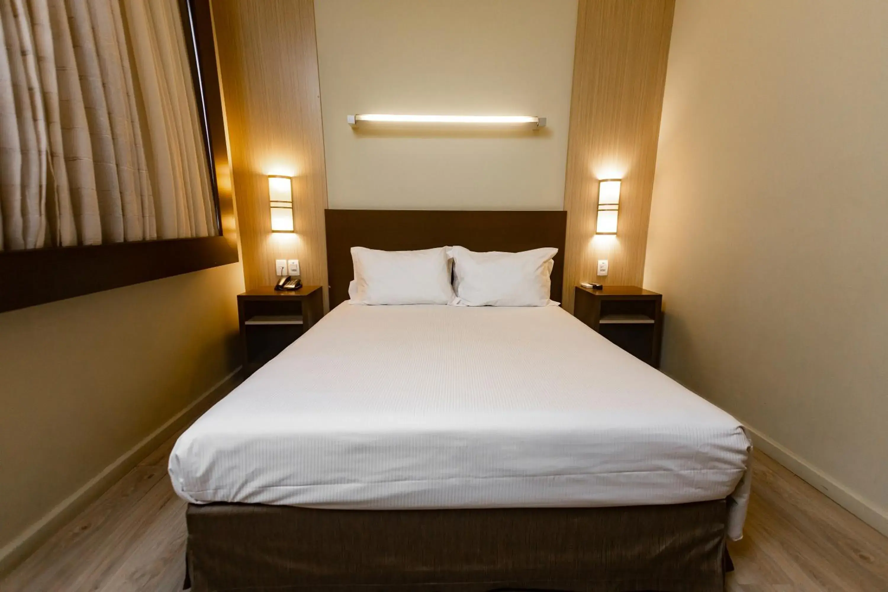 Bed in Master Cosmopolitan Moinhos de Vento Bed in Master Cosmopolitan Moinhos de Vento